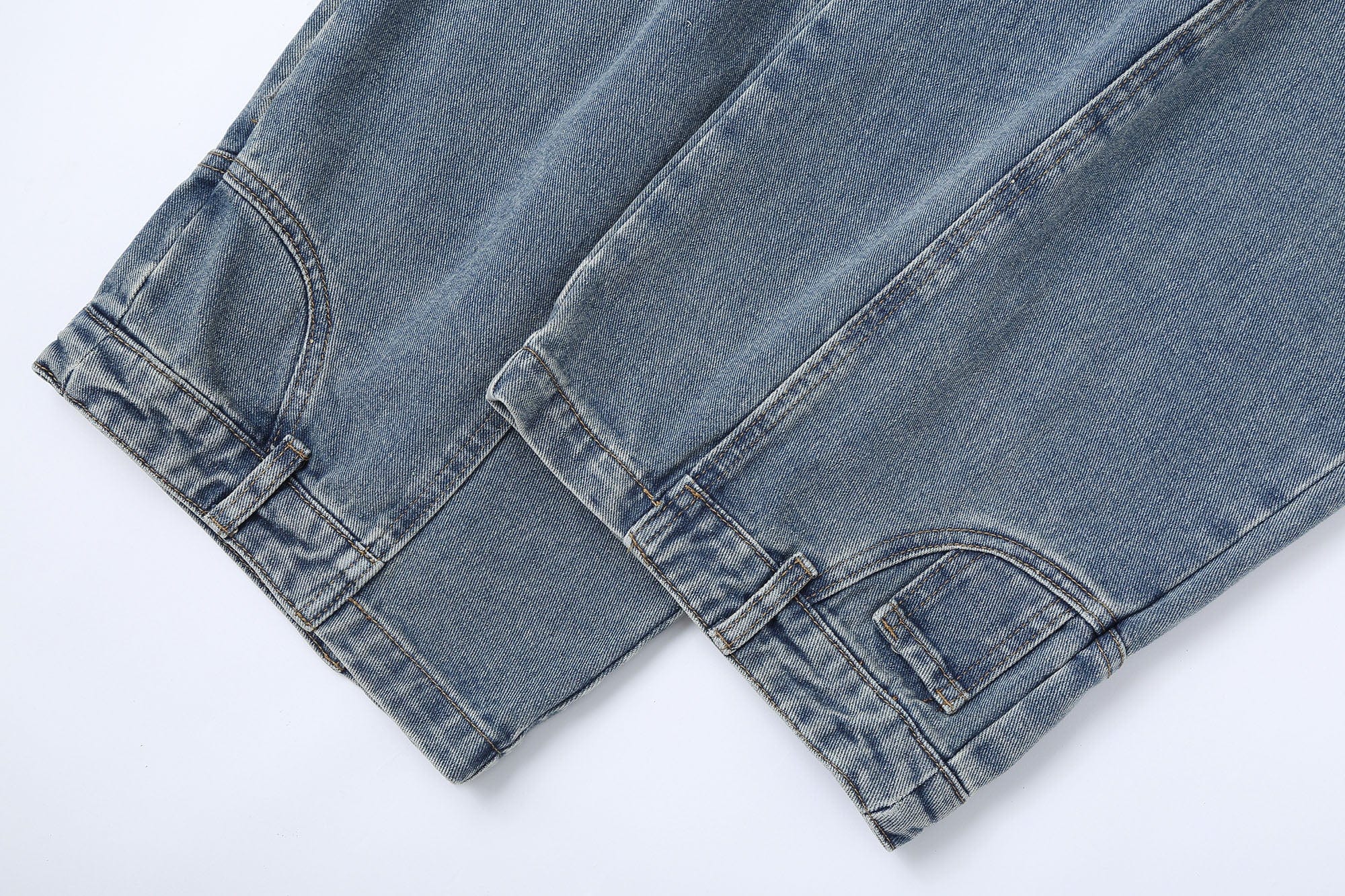 CLP Inverted-Waist Hem Paneled Distressed Jeans