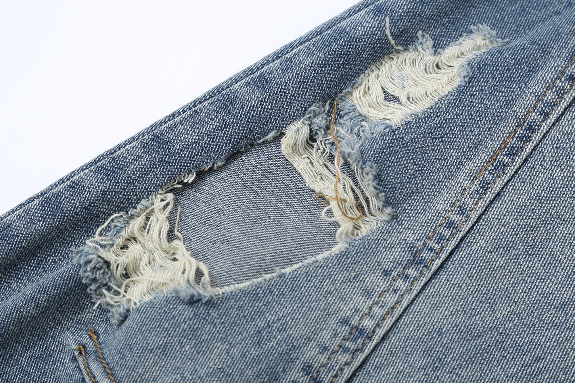 CLP Inverted-Waist Hem Paneled Distressed Jeans