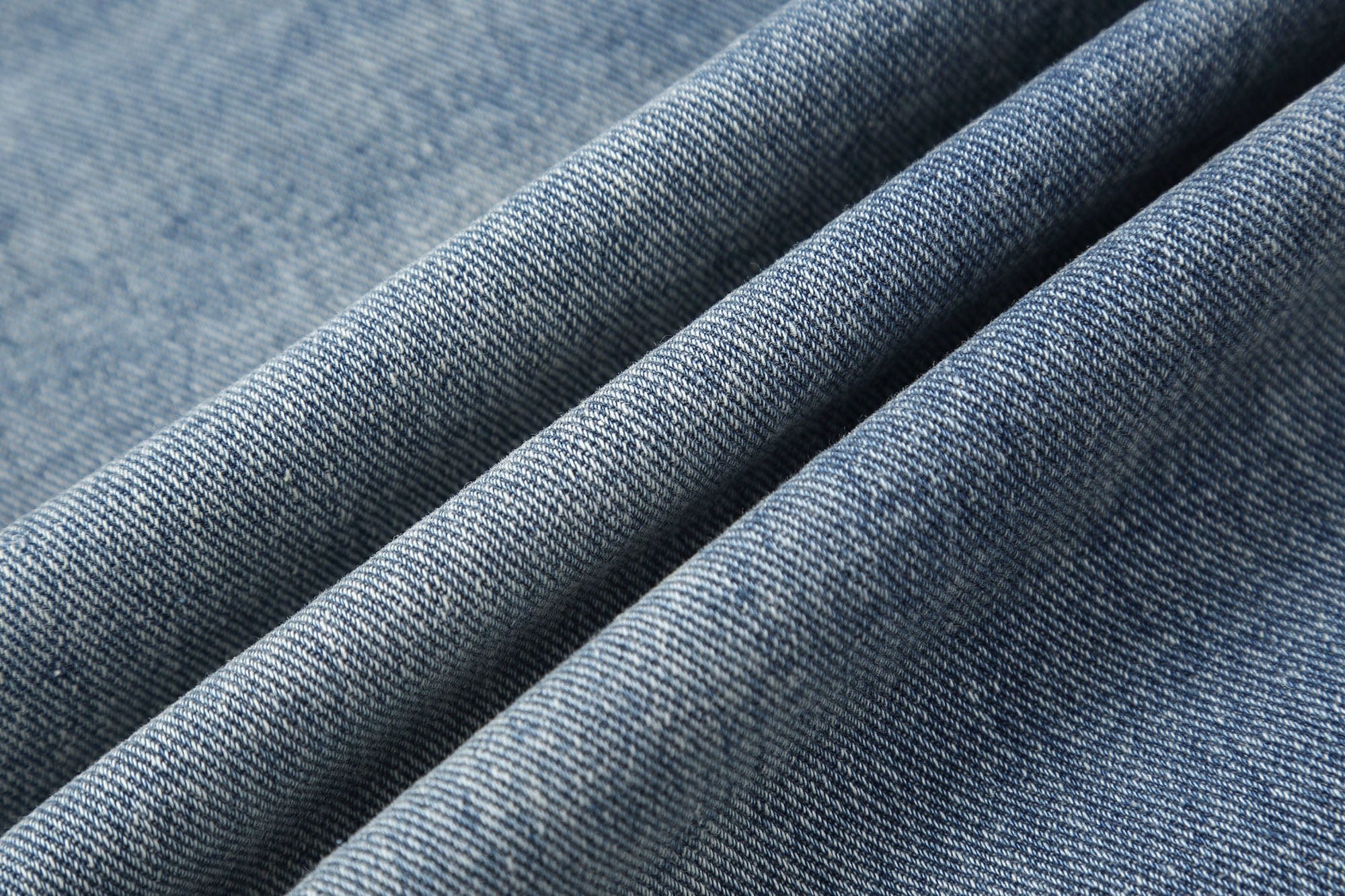 CLP Inverted-Waist Hem Paneled Distressed Jeans