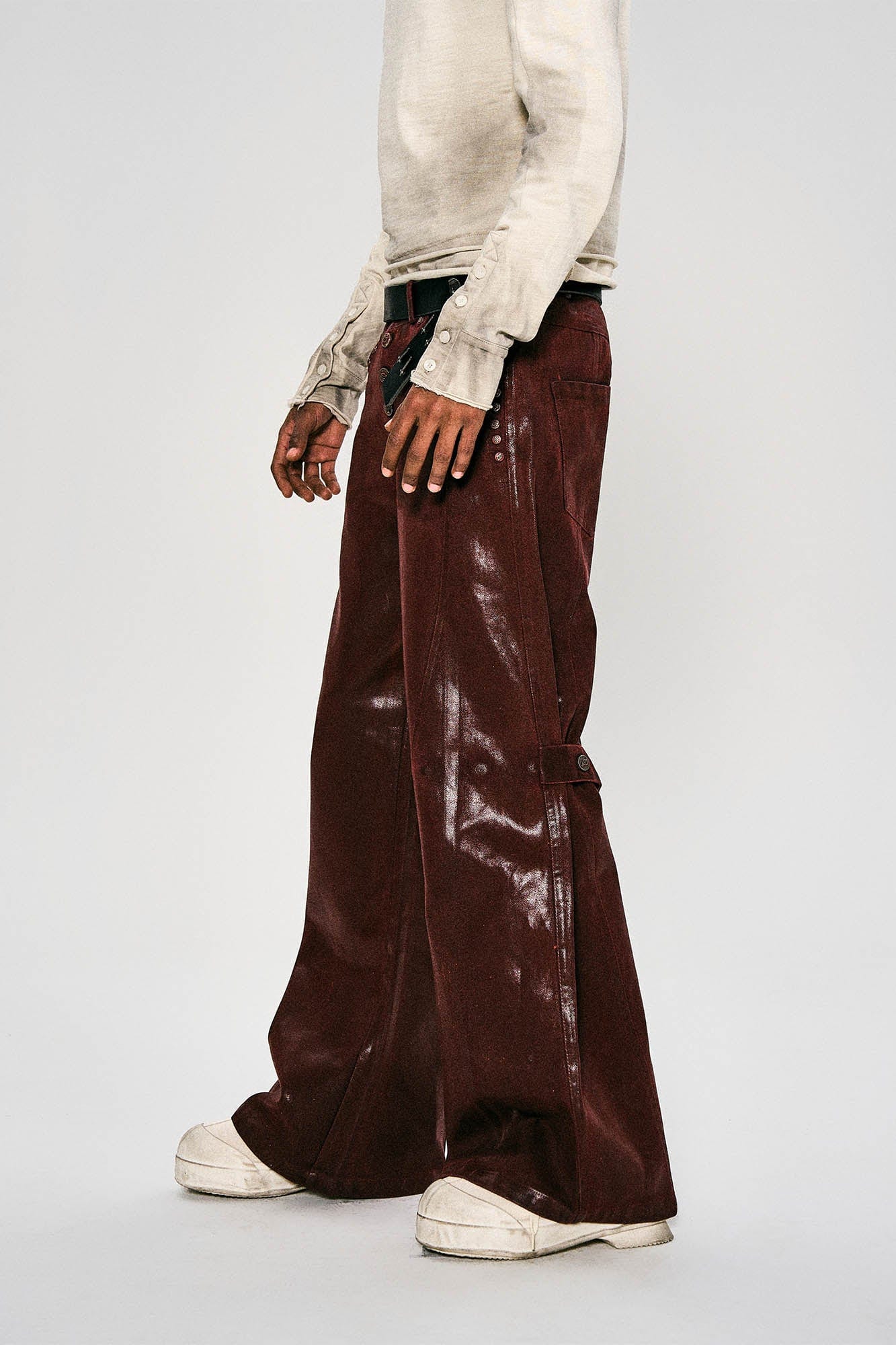 FLYERRER Waxed Spliced Studded Flared Pants