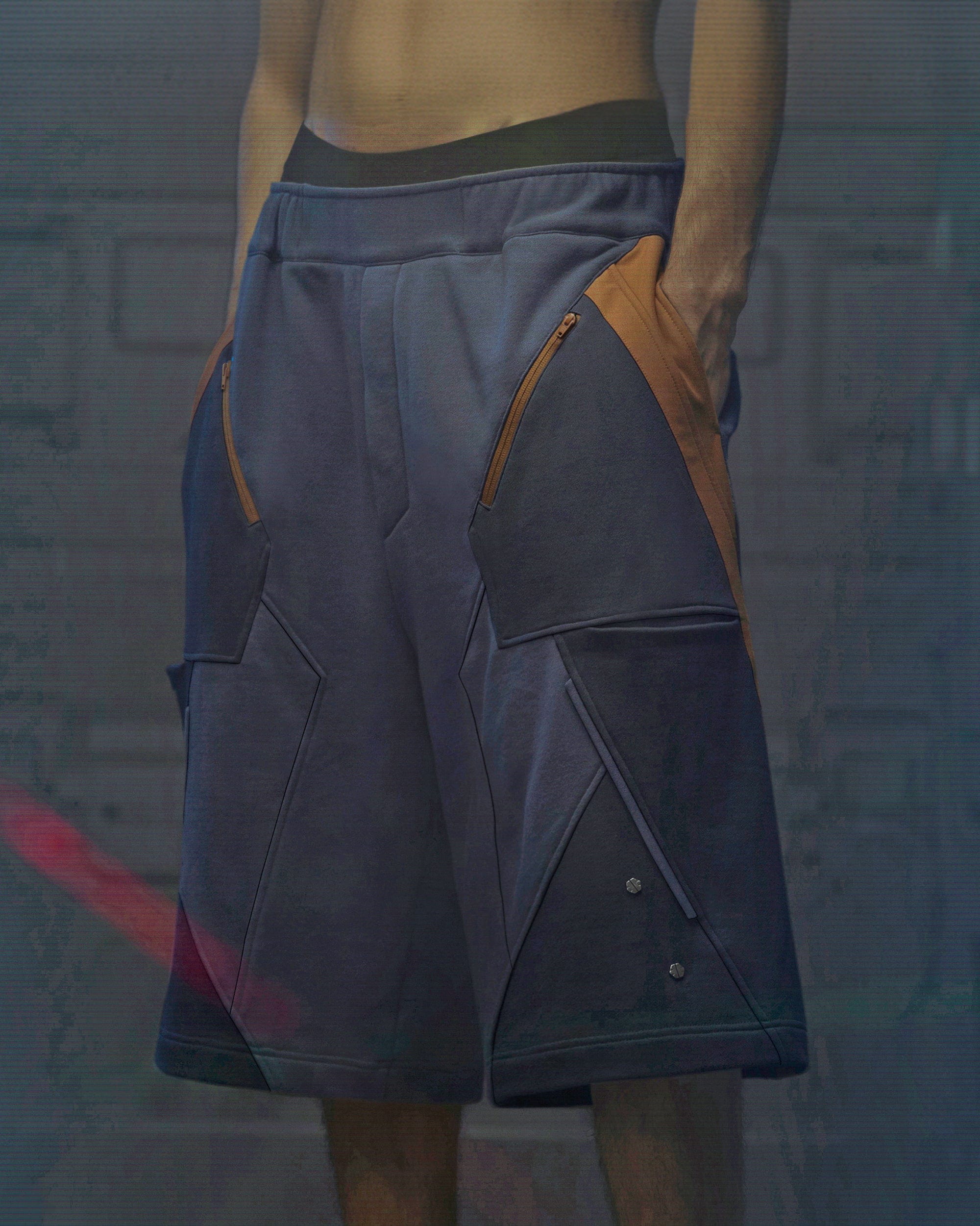 XIPHEVIL Deconstructed Zipper Rivet Shorts Orange