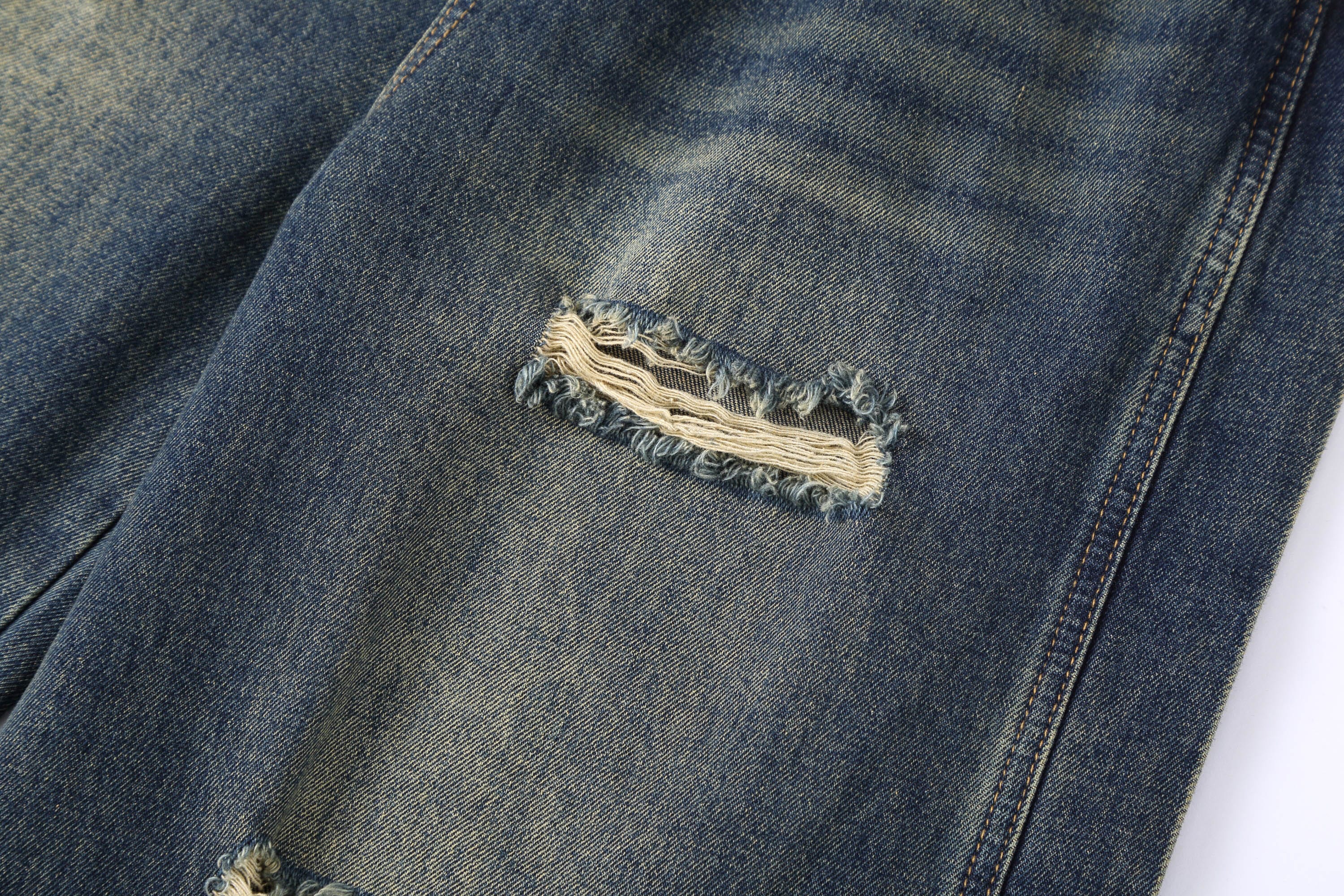 CLP Distressed Buttoned Wide-Leg Jeans