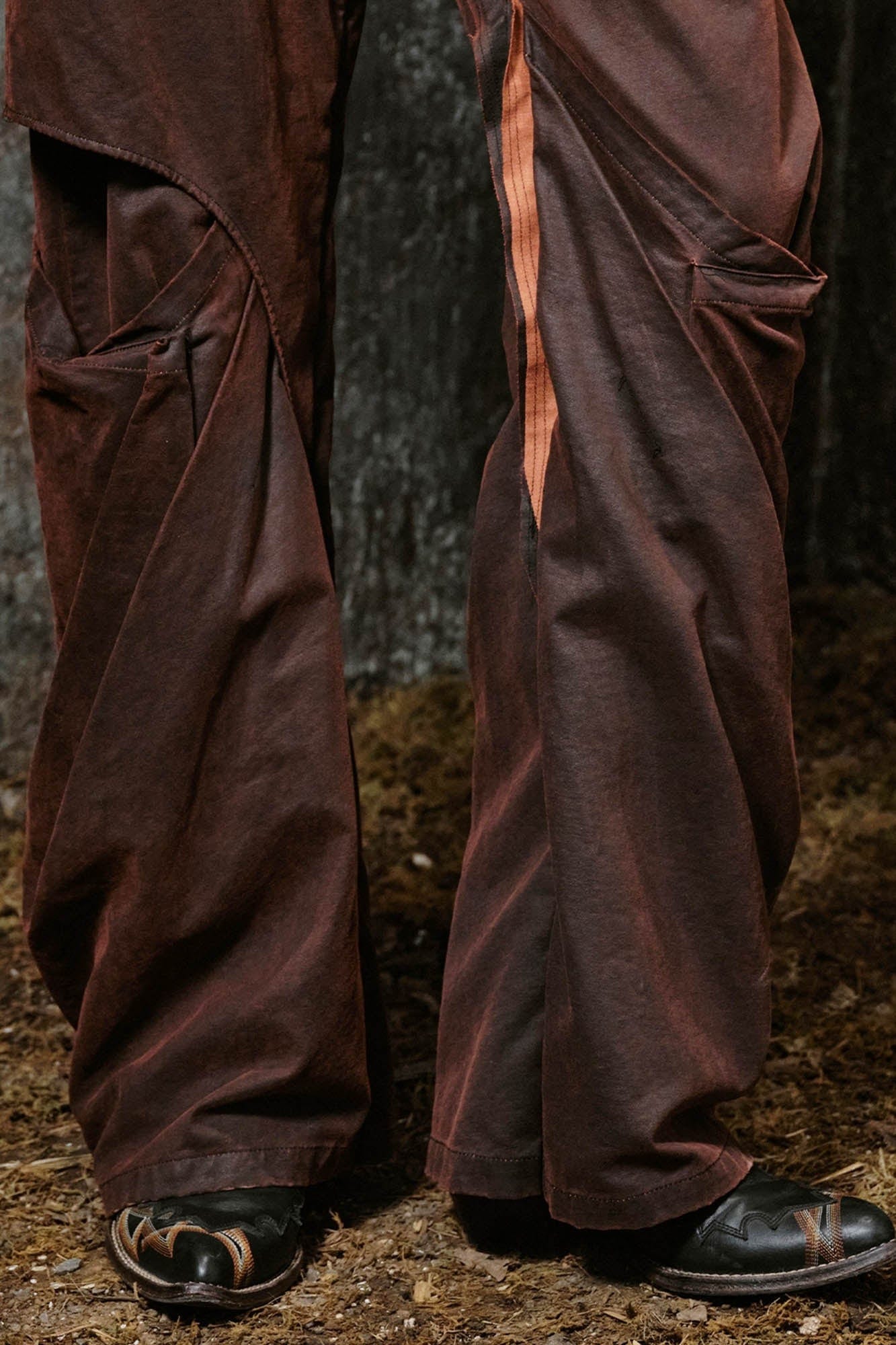 ILNya Nieternite Nifutur Weathered Coated Deconstructed Trousers