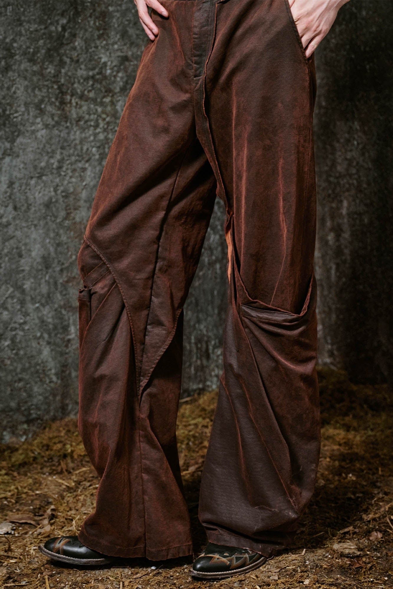 ILNya Nieternite Nifutur Weathered Coated Deconstructed Trousers