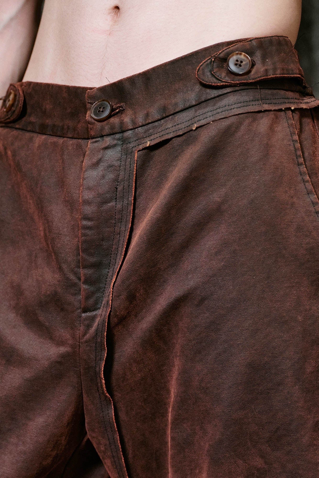 ILNya Nieternite Nifutur Weathered Coated Deconstructed Trousers