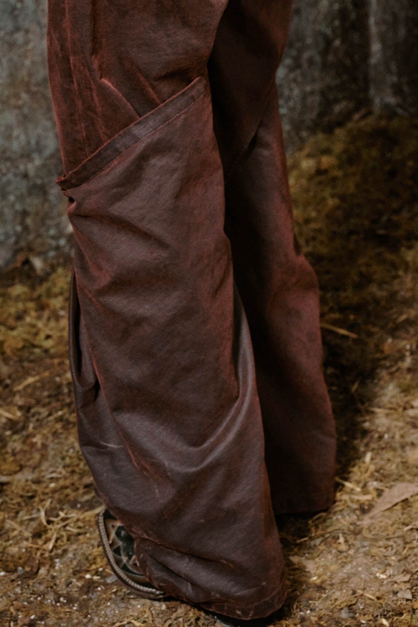 ILNya Nieternite Nifutur Weathered Coated Deconstructed Trousers