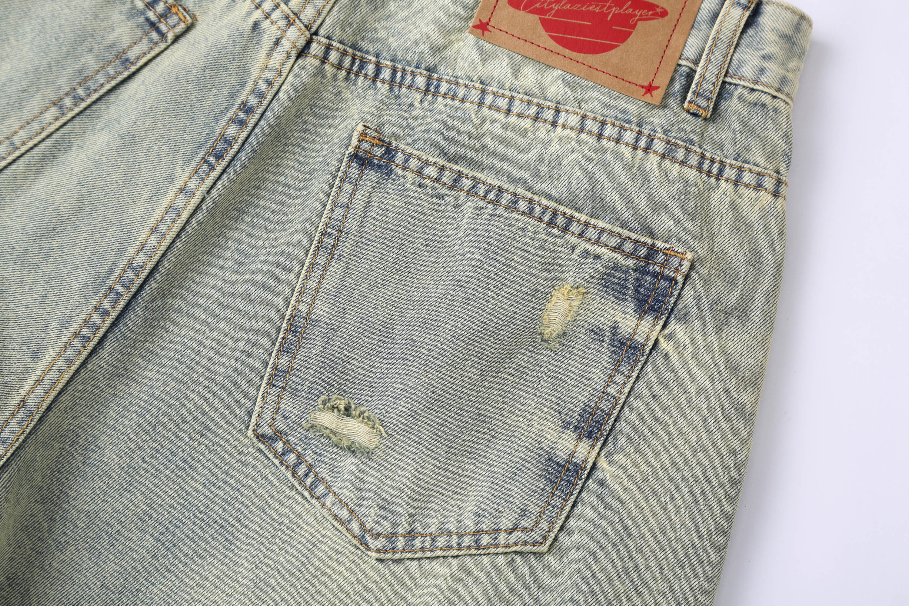 CLP Washed Ripped Knee-Length Denim Shorts