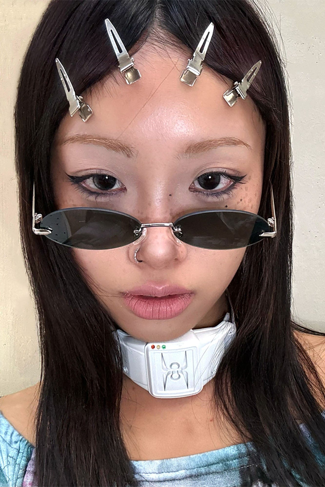 DAMAGE ASIA Oval Rimless Translucent Sunglasses