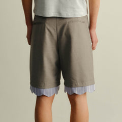 KADAKADA Scalloped Layered Hem Pleated Shorts