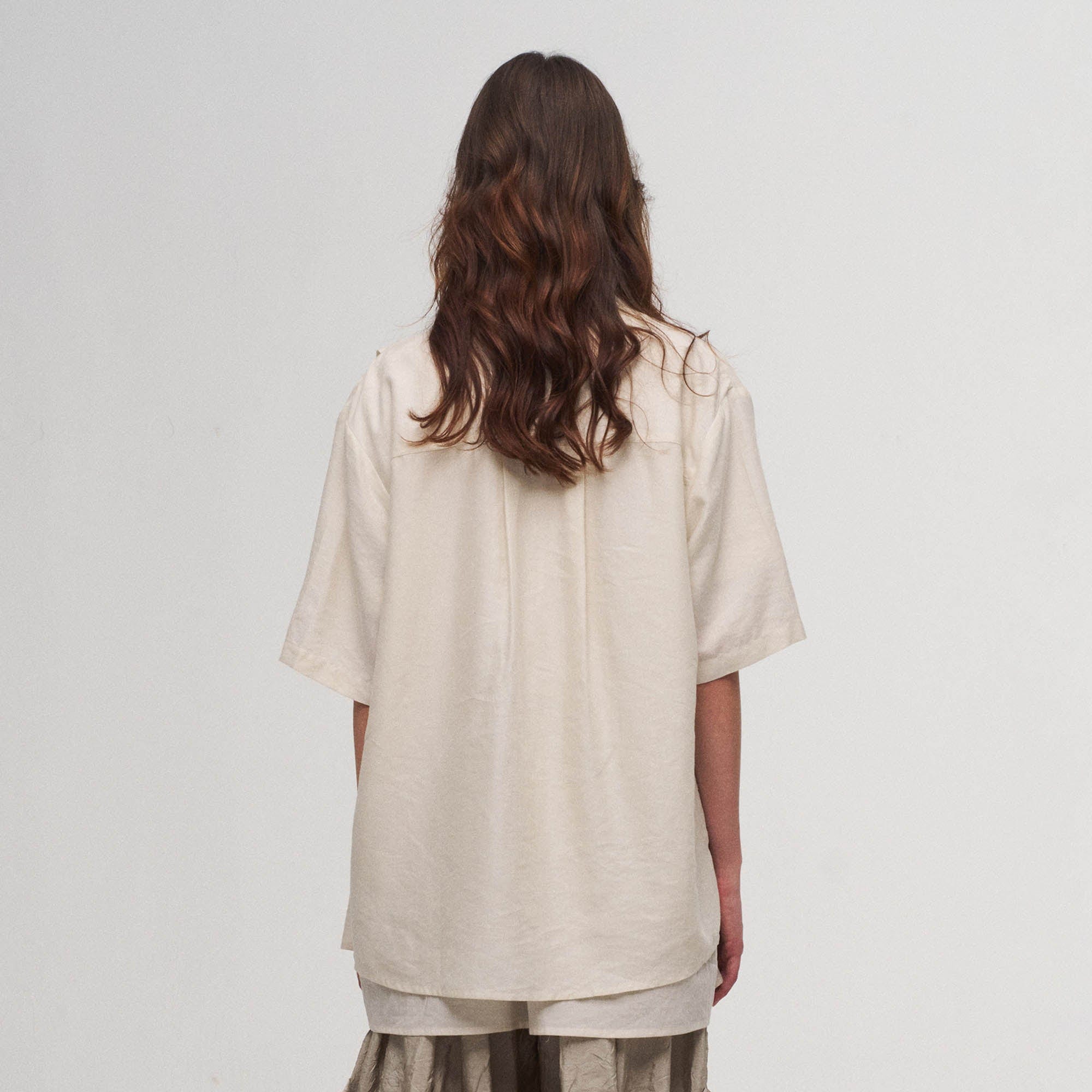 ILNya Nieternite Nifutur Asymmetrical Ruffle Iris Half Shirt