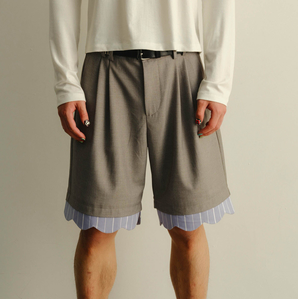 KADAKADA Scalloped Layered Hem Pleated Shorts