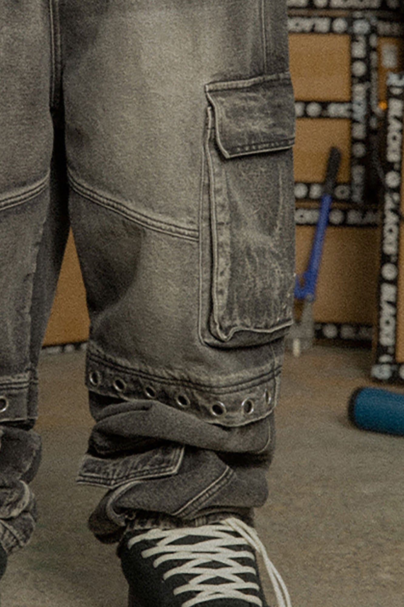 BLACK8MOB Washed Multi-Pocket Grommet Stacked Cargo Jeans