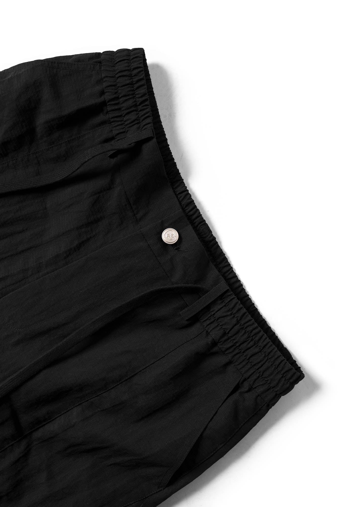 RELABEL Deconstructed Paneled Drawstring Parachute Pants