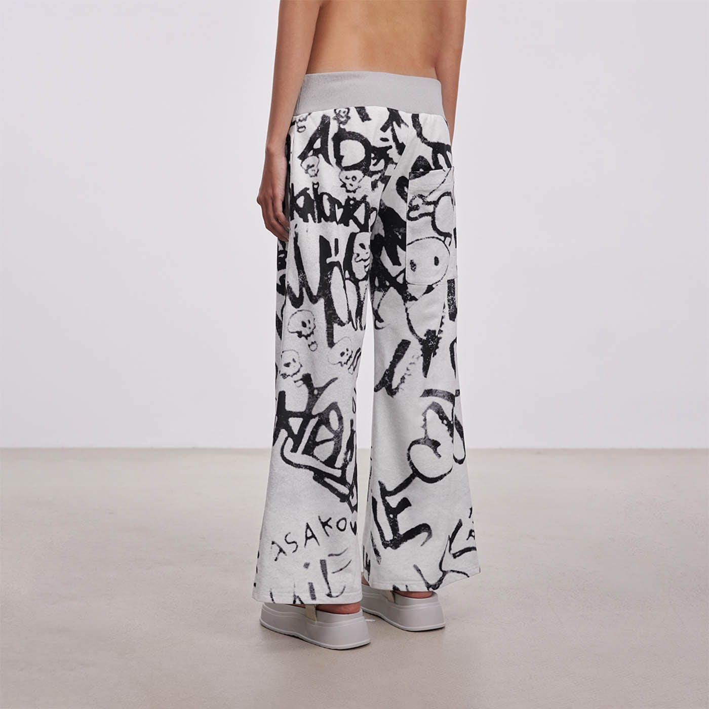 DAMAGE ASIA Doodle Full-Print Wide-Leg Pants