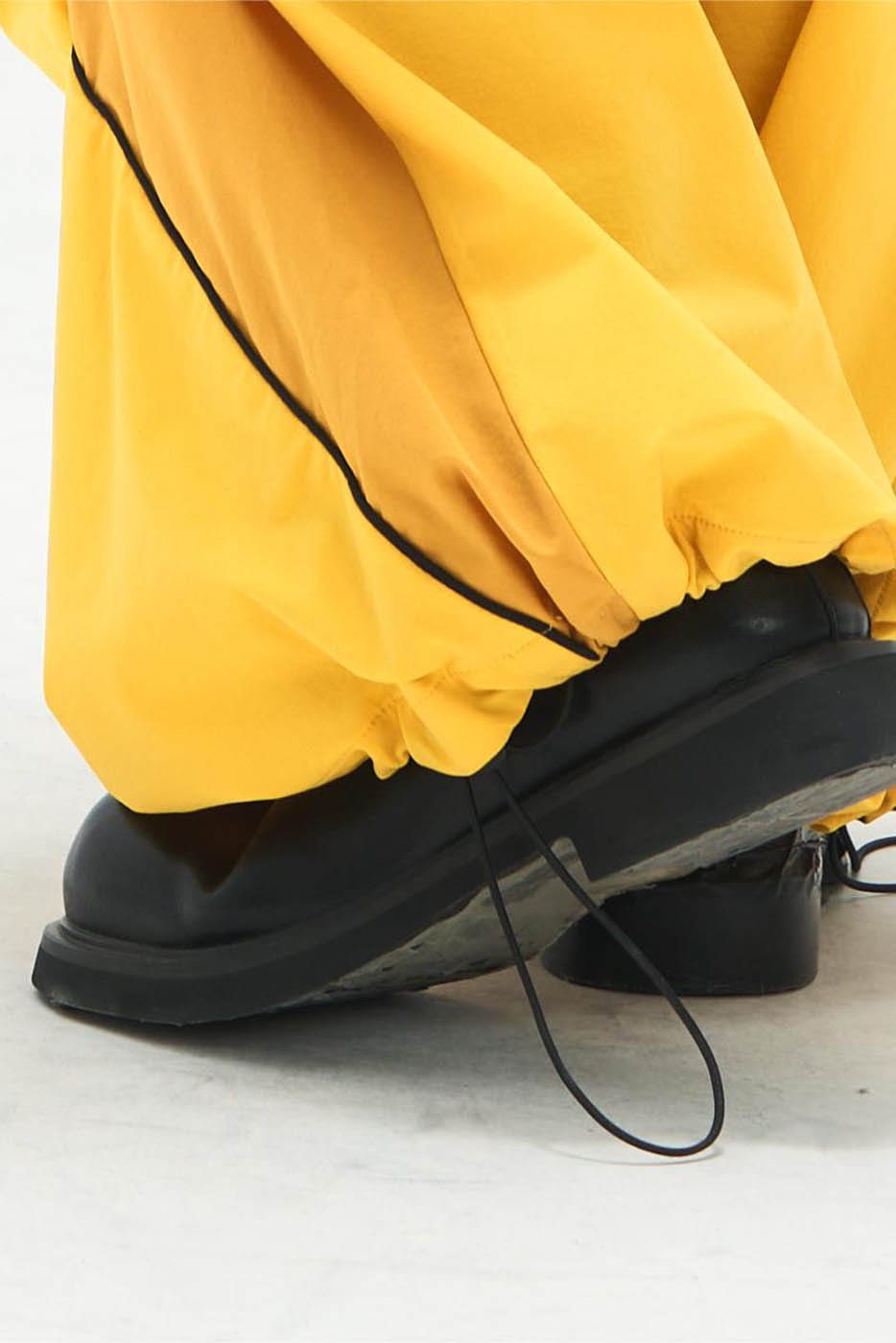 RELABEL Zig-Zag Spliced Pleated Parachute Pants