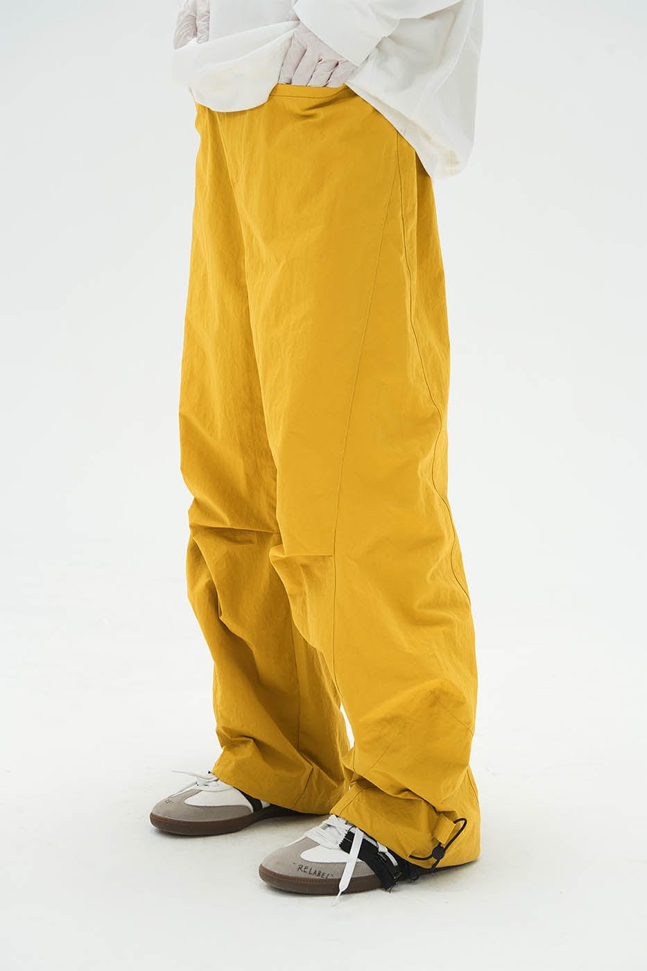 RELABEL Pleated Spliced Parachute Pants