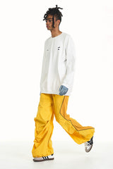 RELABEL Zig-Zag Spliced Pleated Parachute Pants
