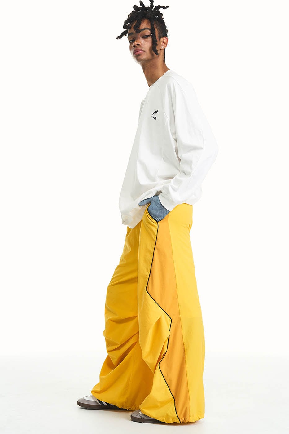 RELABEL Zig-Zag Spliced Pleated Parachute Pants