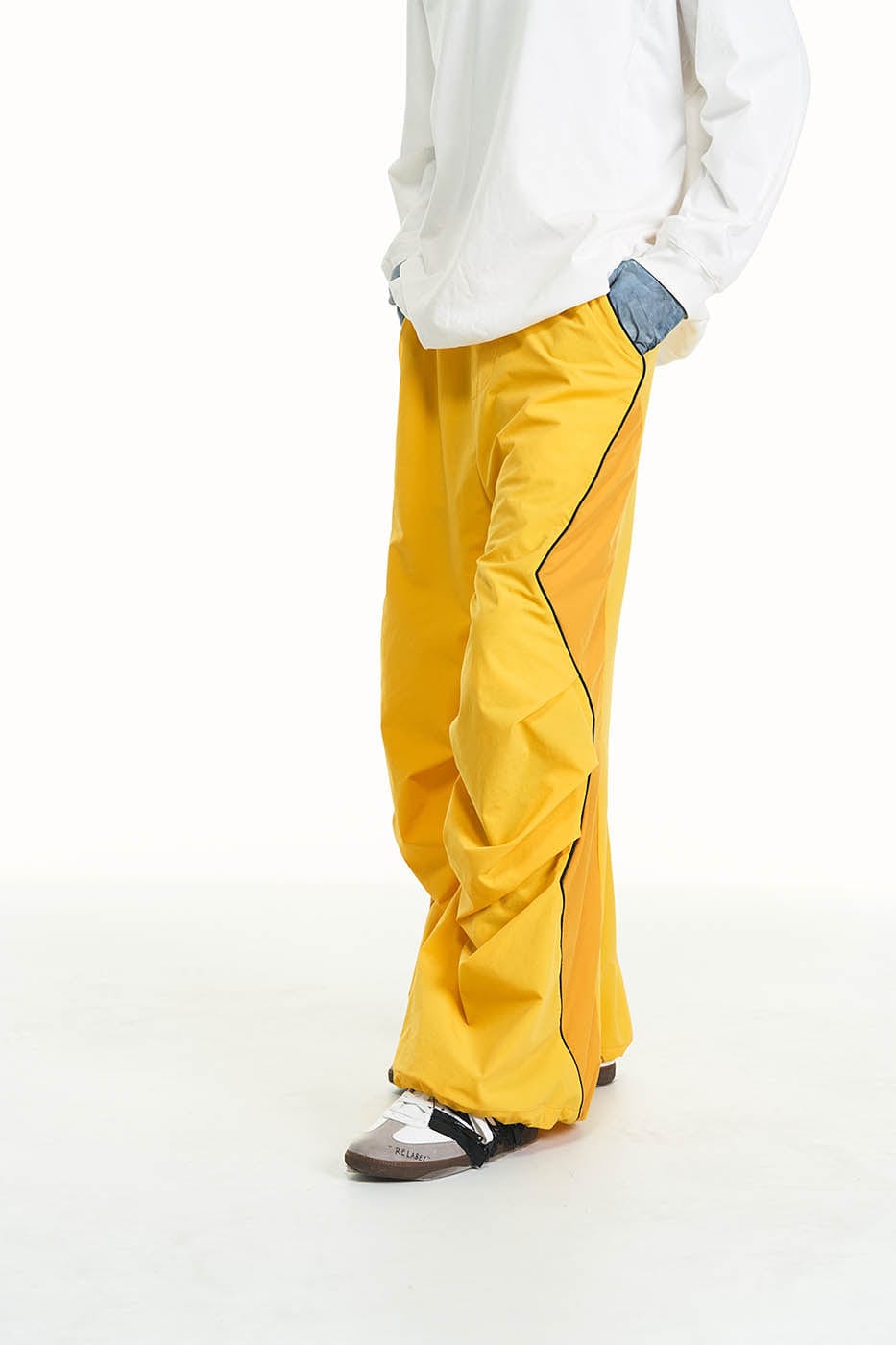 RELABEL Zig-Zag Spliced Pleated Parachute Pants
