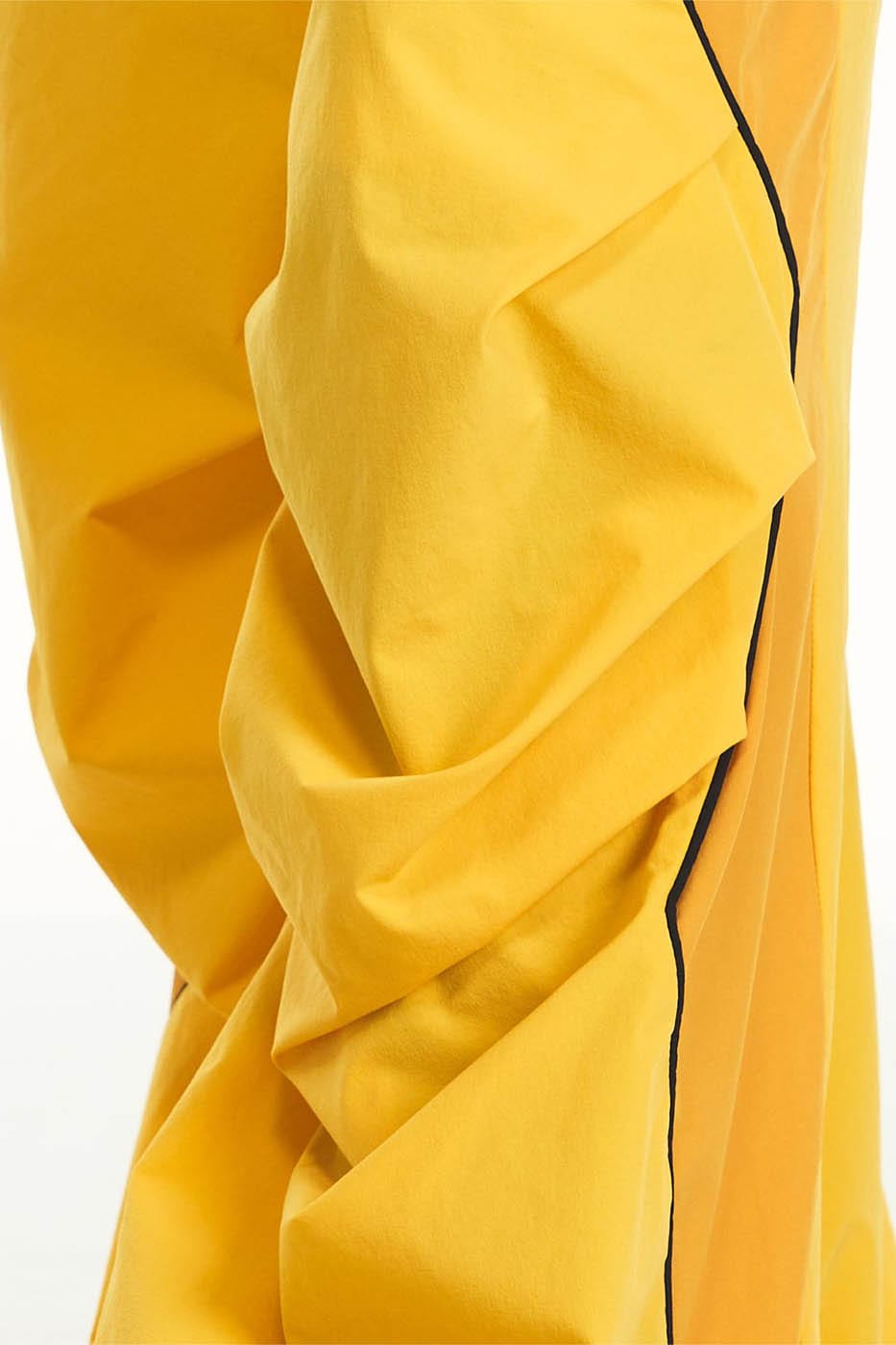 RELABEL Zig-Zag Spliced Pleated Parachute Pants