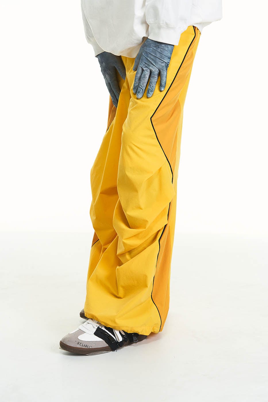 RELABEL Zig-Zag Spliced Pleated Parachute Pants