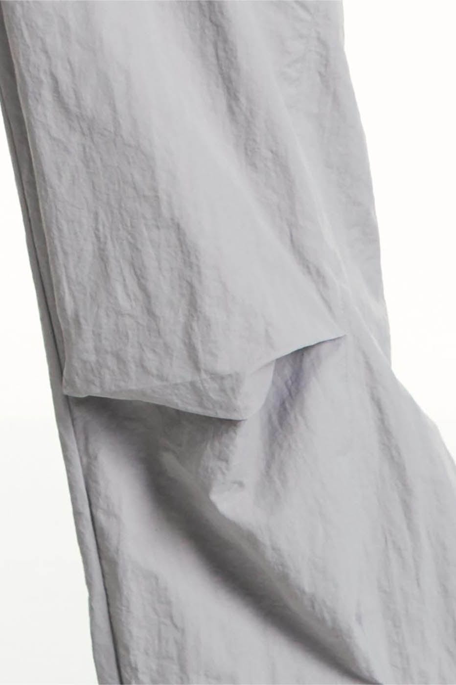 RELABEL Pleated Spliced Parachute Pants