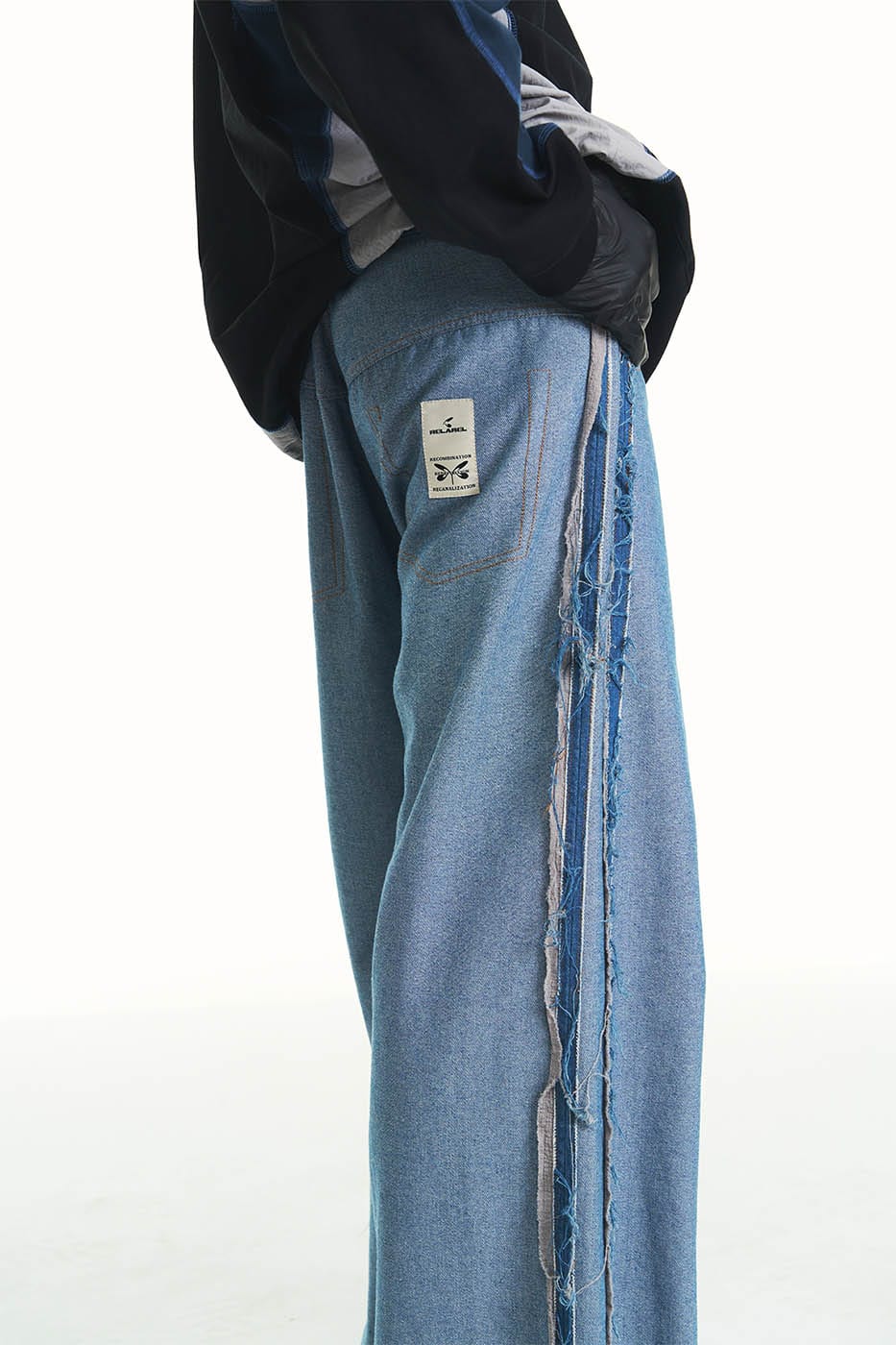 RELABEL Inside-Out Spliced Frayed Baggy Jeans
