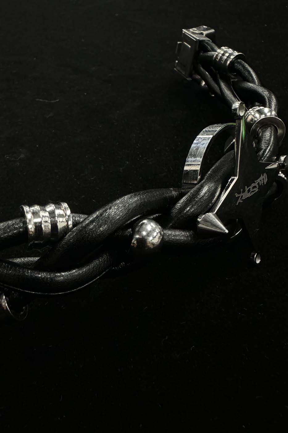 ILLUSORY Four-Point Star Braided Faux Leather Bracelet