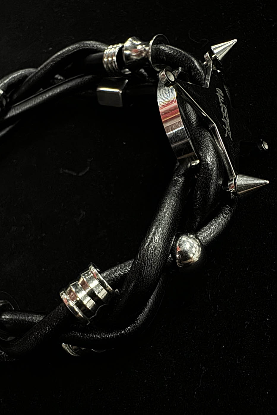 ILLUSORY Four-Point Star Braided Faux Leather Bracelet