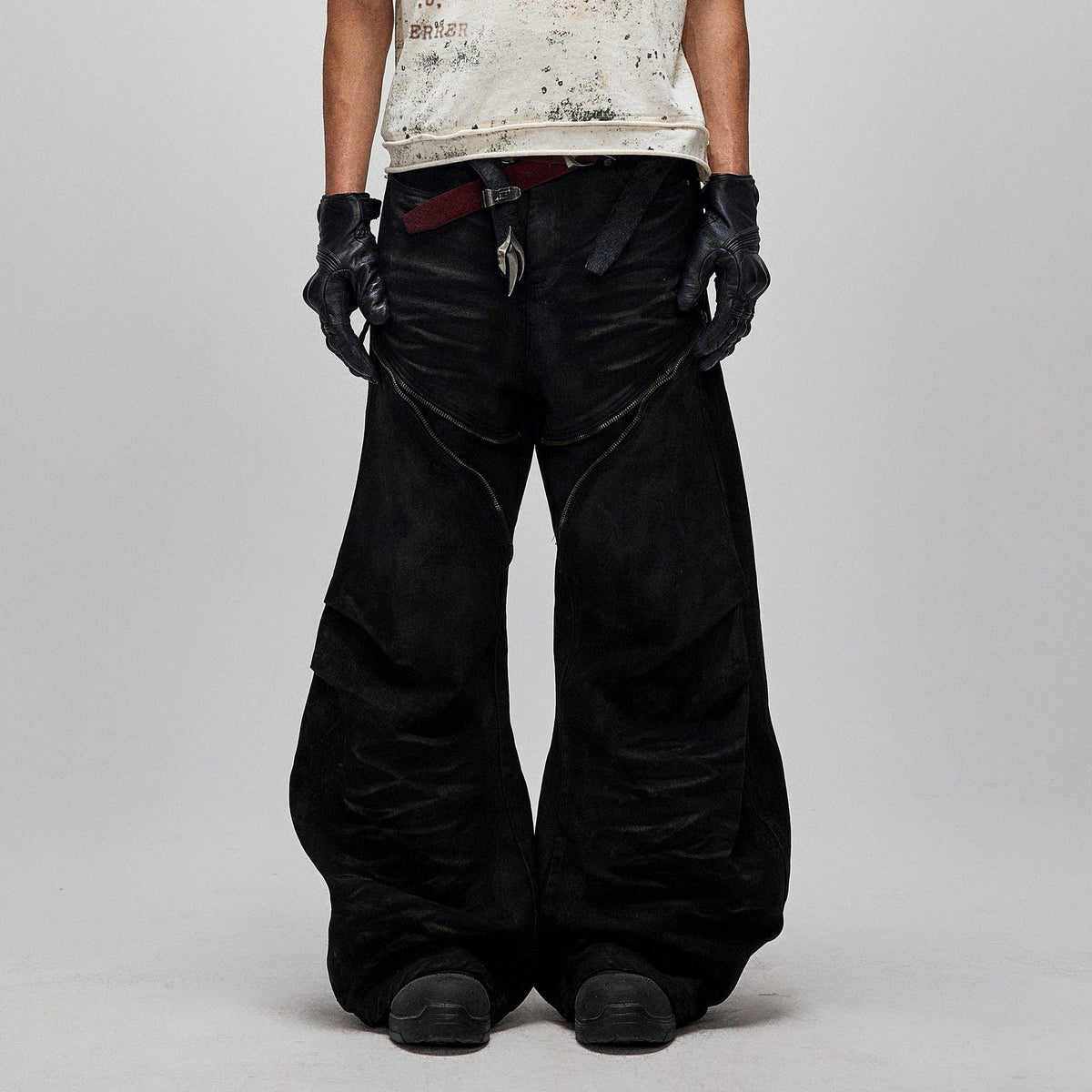 FLYERRER Distressed Waxed Zipper-Paneled Scimitar Pants