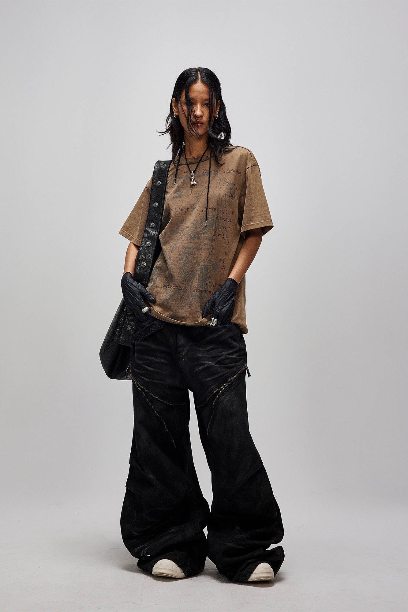 FLYERRER Distressed Waxed Zipper-Paneled Scimitar Pants