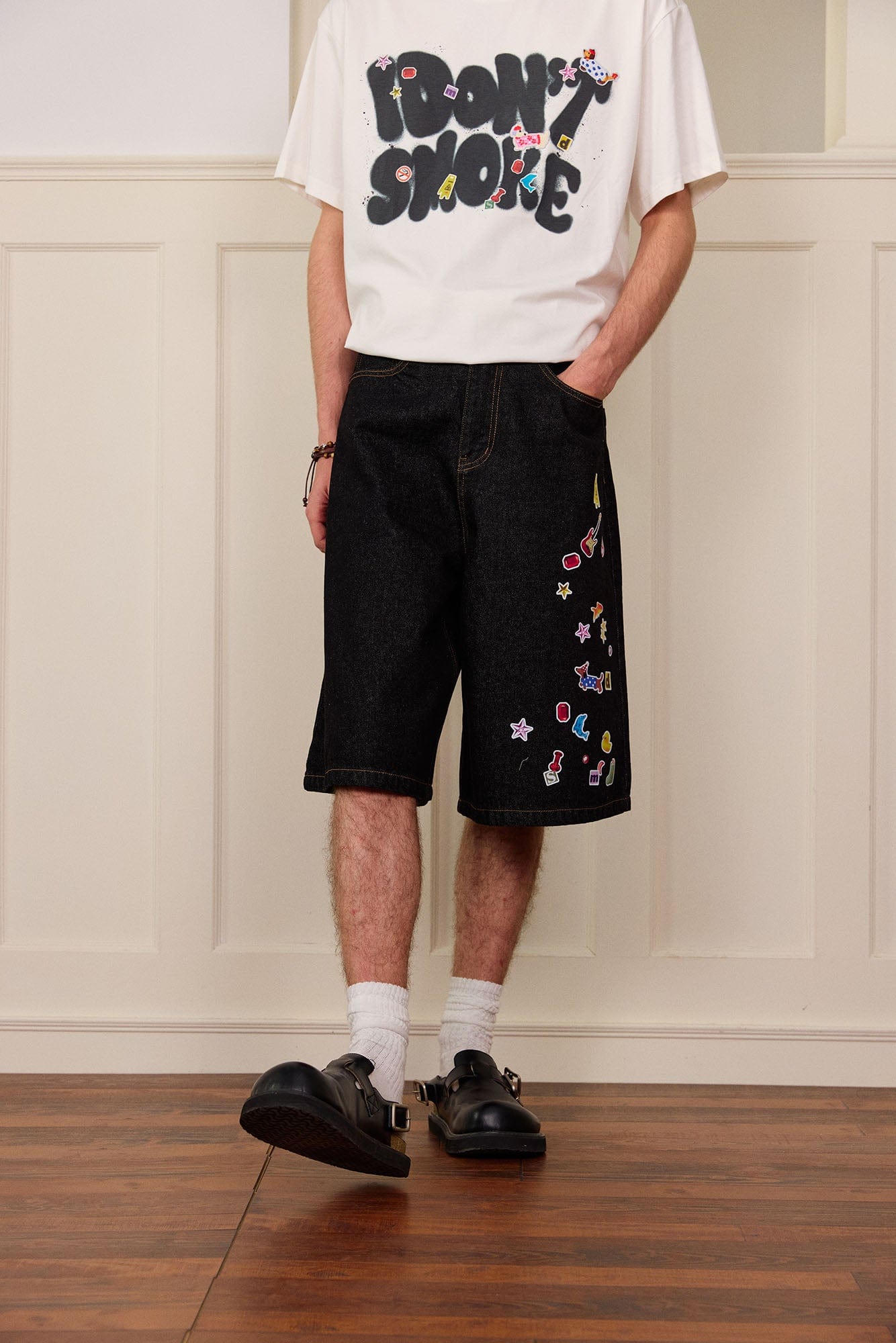 DONSMOKE Whimsical Stickers Washed Raw-Edge Shorts