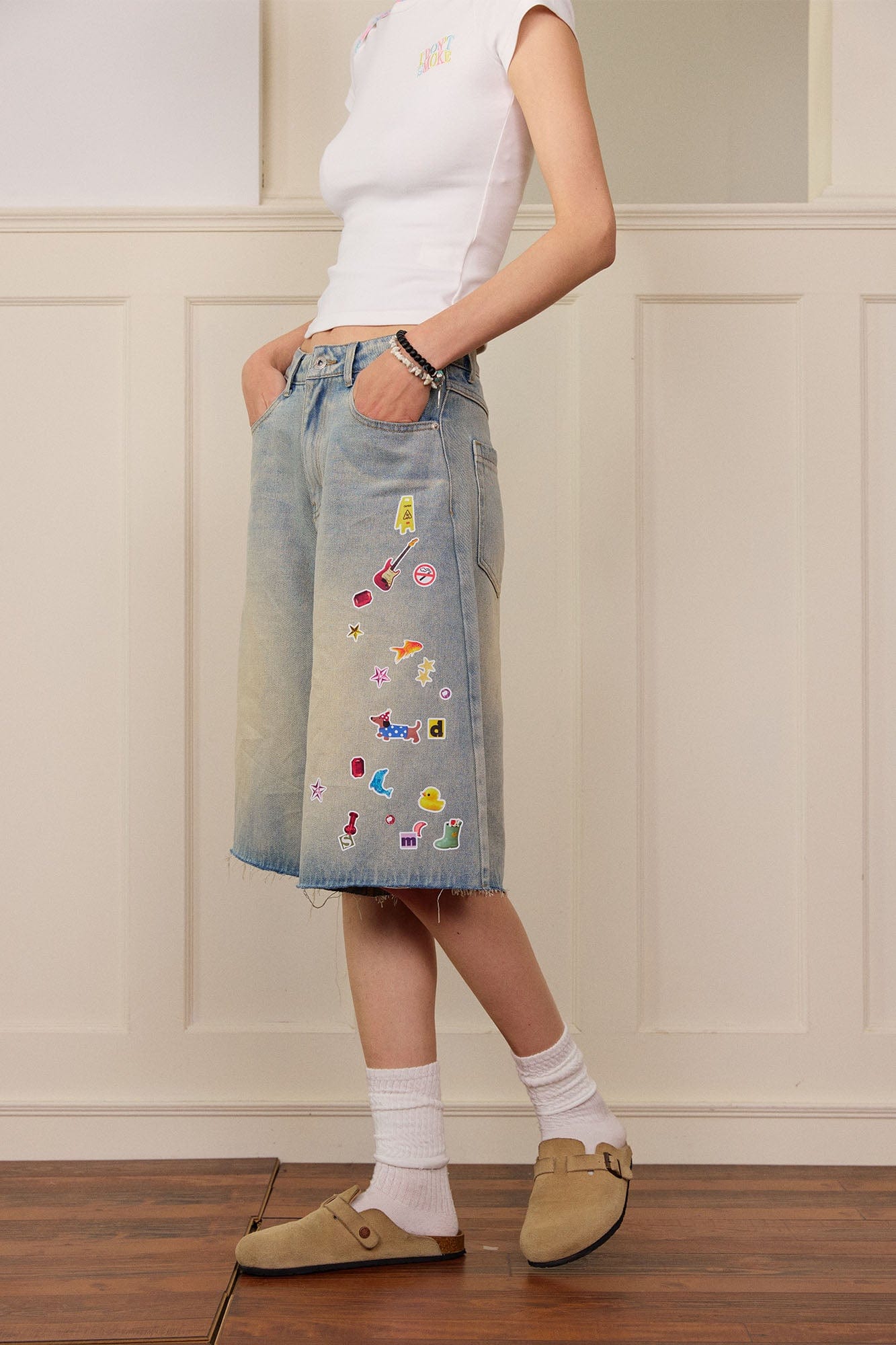 DONSMOKE Whimsical Stickers Washed Raw-Edge Shorts