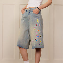 DONSMOKE Whimsical Stickers Washed Raw-Edge Shorts