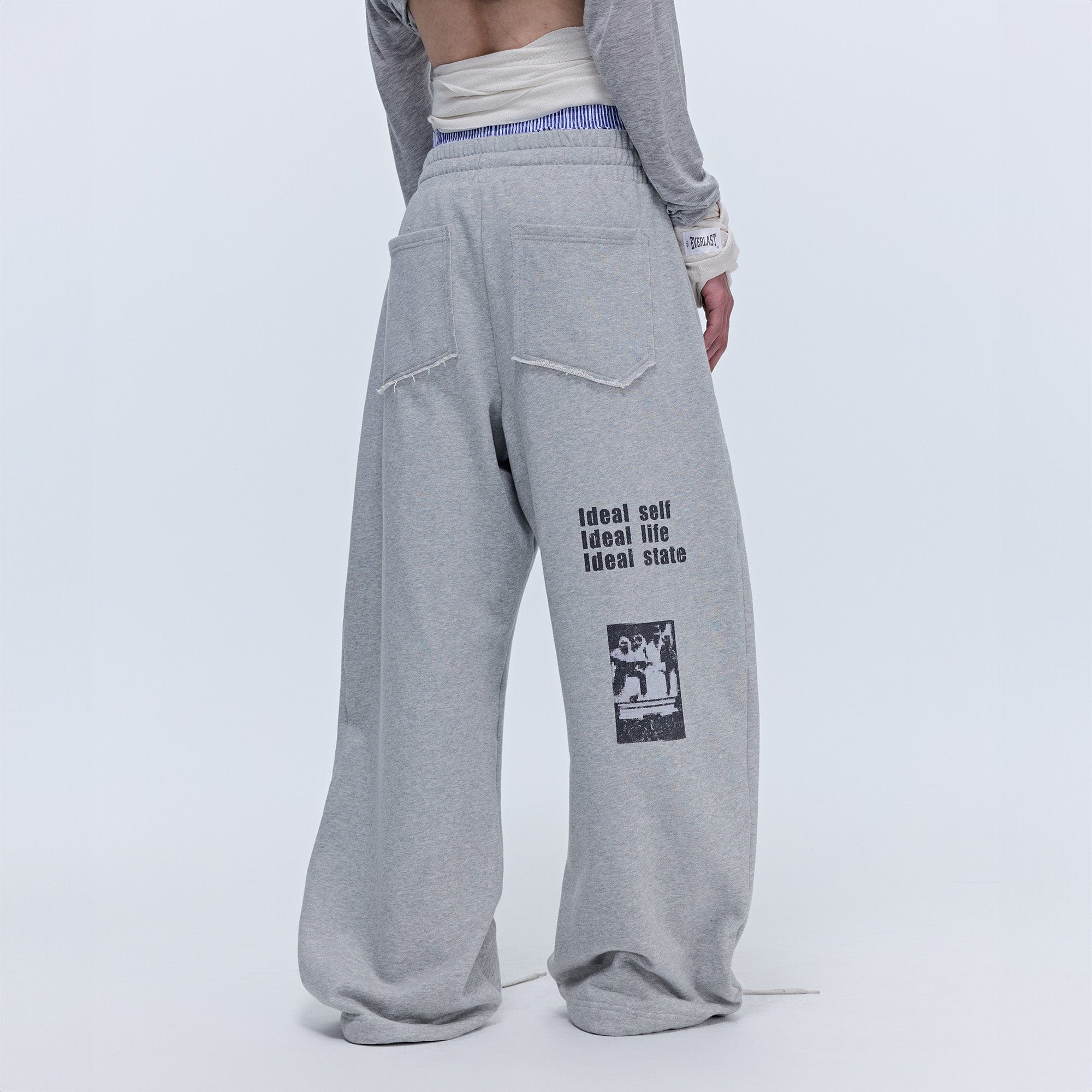 SAVAGEGROWTHWORLD Slogan Curved Drawstring Sweatpants
