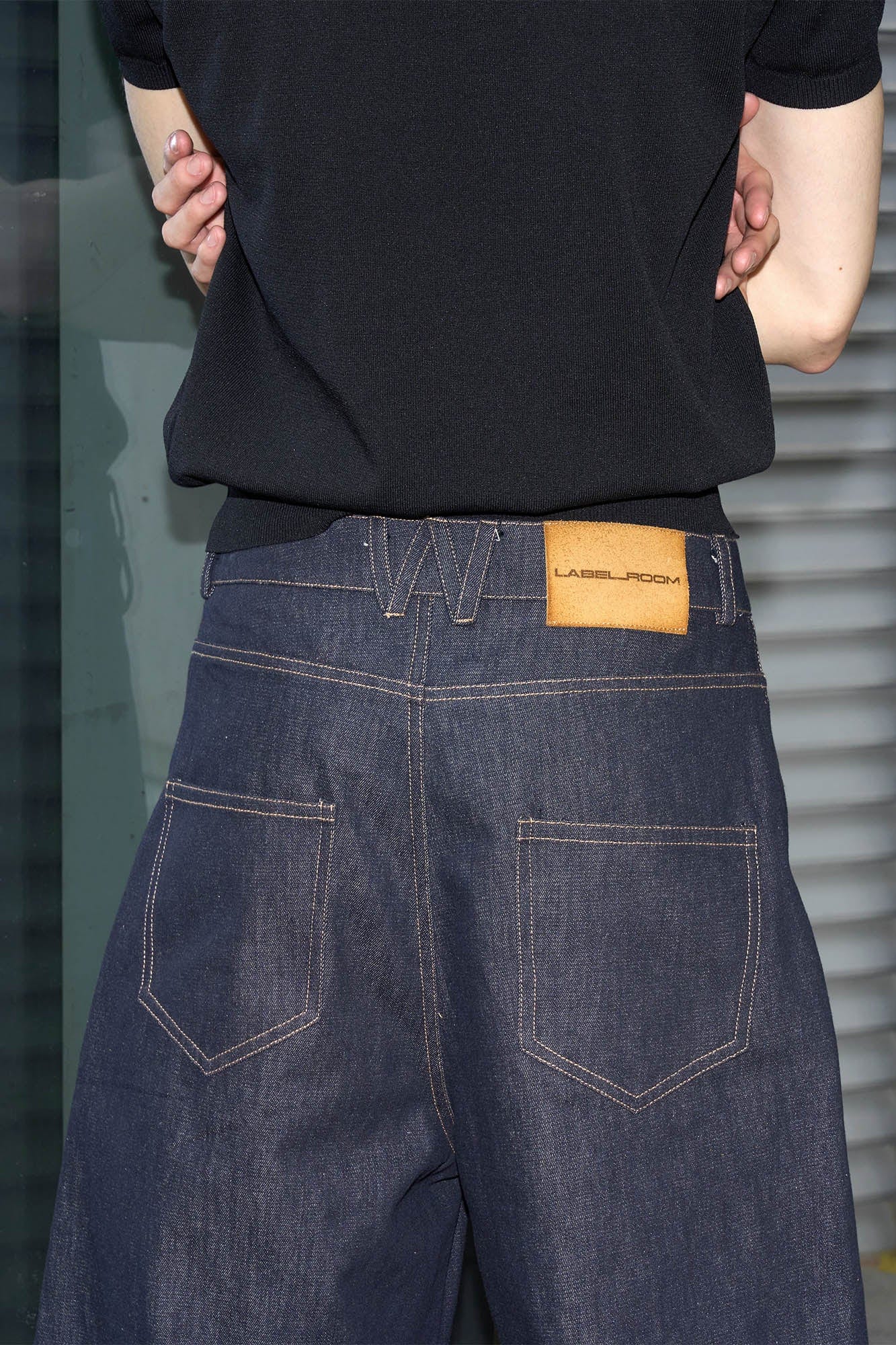49PERCENT Asymmetrical Waist Raw Wide-Leg Jeans