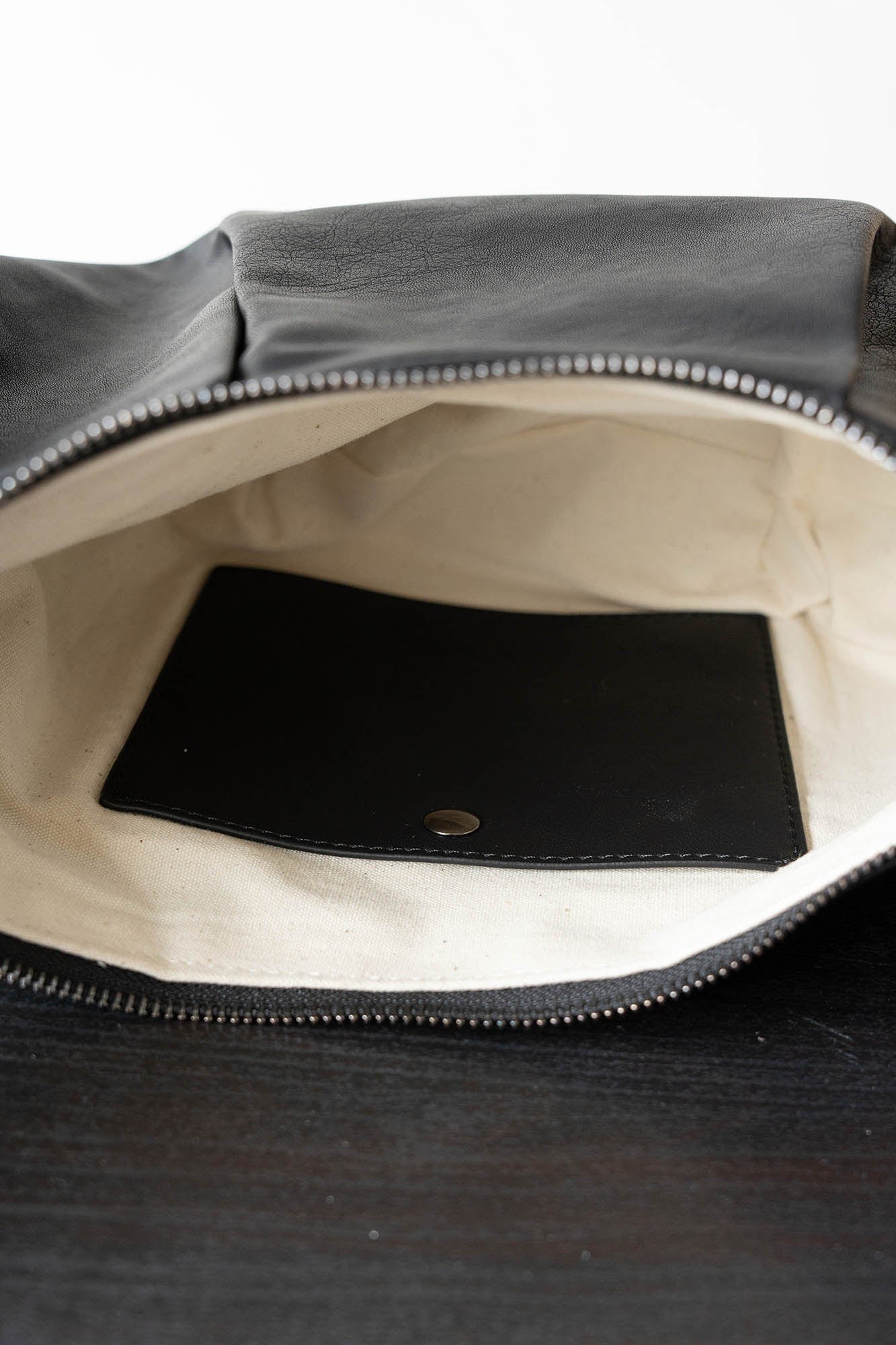 MOITIEDEPETALE Pleated Waxed Leather Croissant Bag