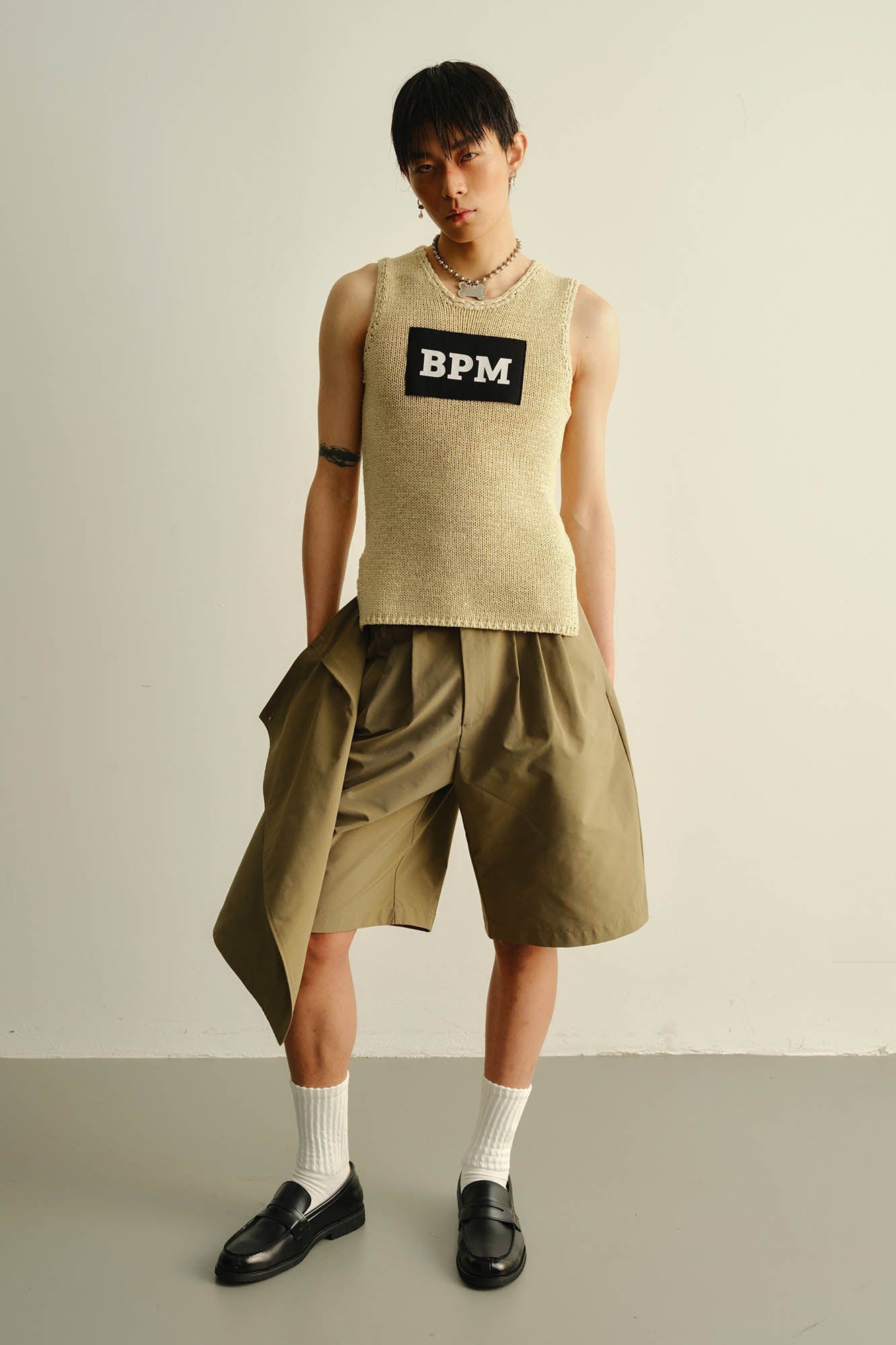KADAKADA Asymmetrical Overlay Pleated Shorts