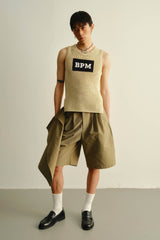 KADAKADA Asymmetrical Overlay Pleated Shorts