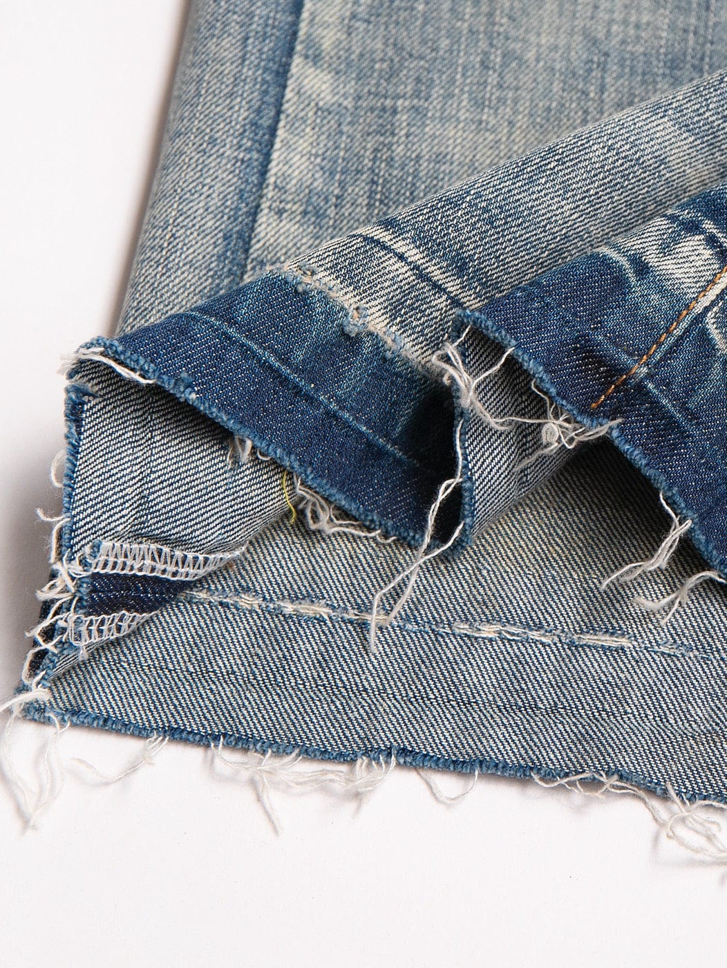 LEONSENSE Raw Edge Washed Flared Jeans