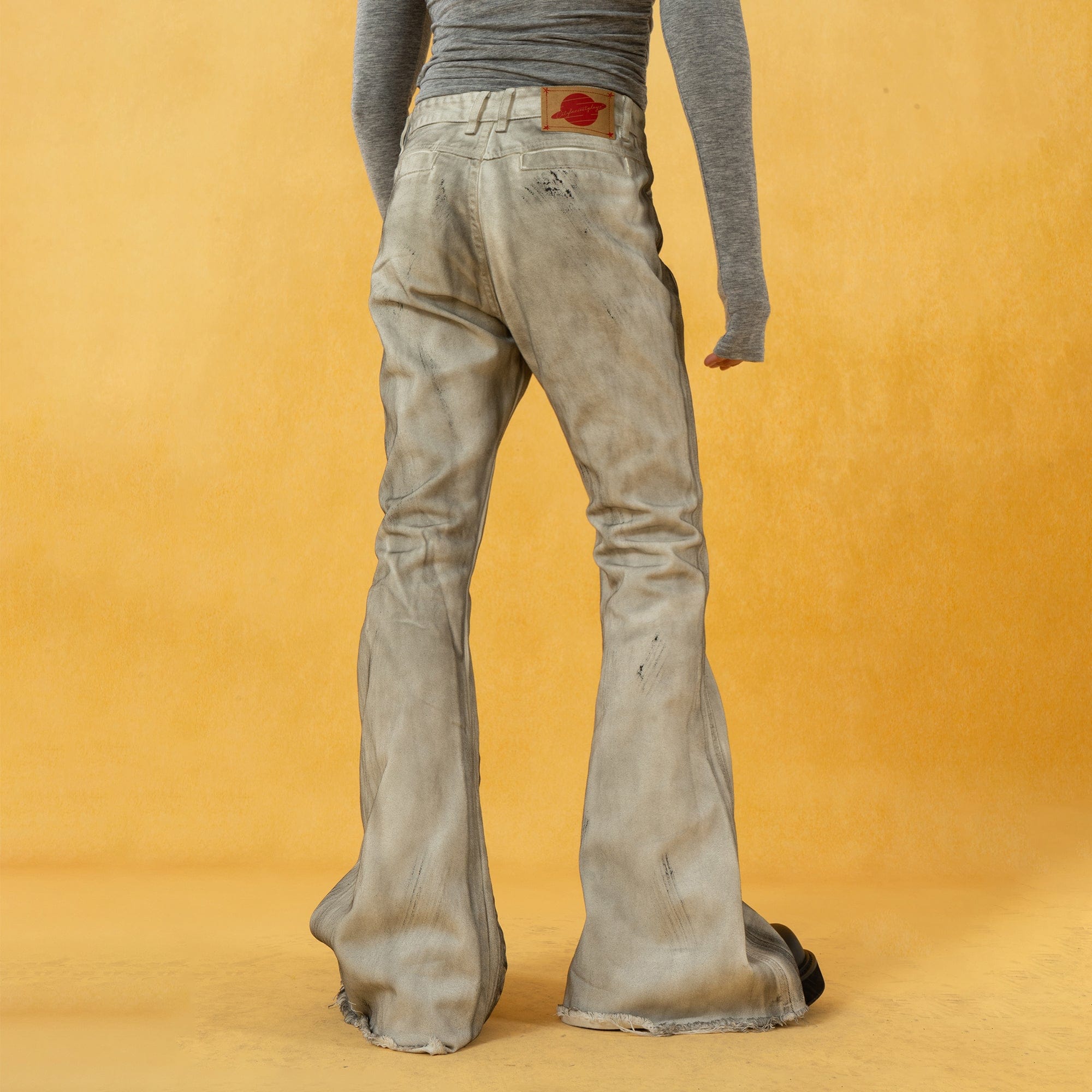 CLP Spliced Distressed Raw Edge Flared Jeans