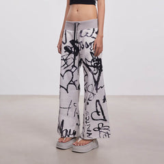 DAMAGE ASIA Doodle Full-Print Wide-Leg Pants