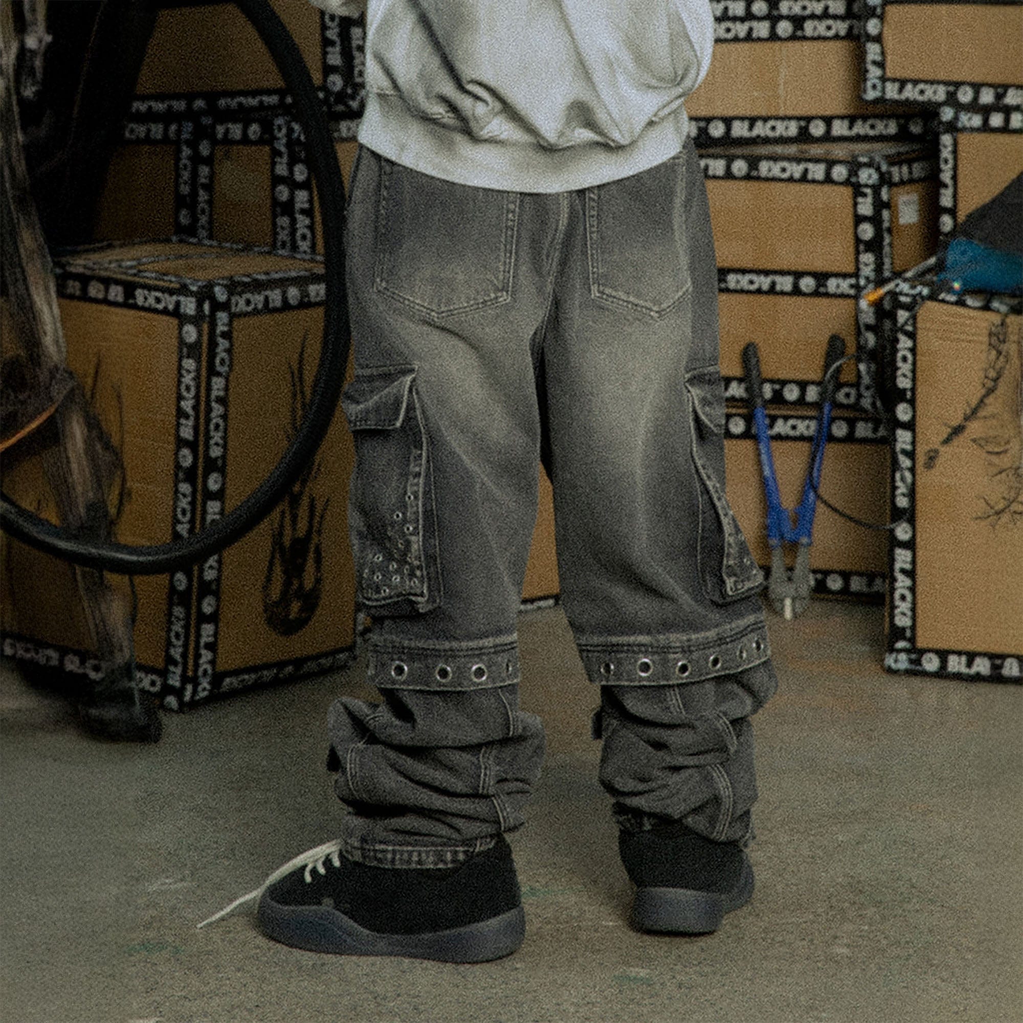 BLACK8MOB Washed Multi-Pocket Grommet Stacked Cargo Jeans
