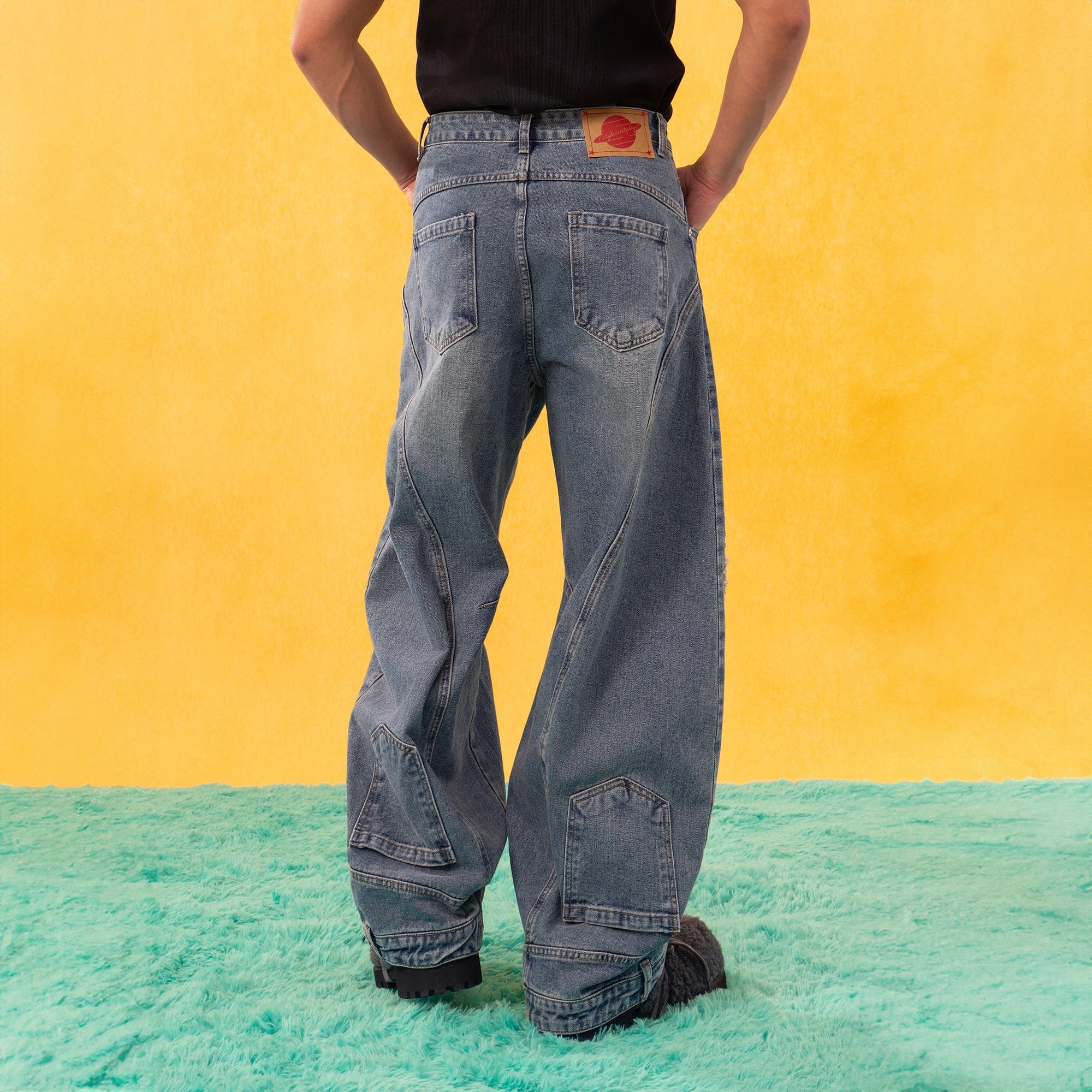 CLP Inverted-Waist Hem Paneled Distressed Jeans