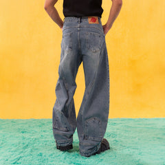 CLP Inverted-Waist Hem Paneled Distressed Jeans