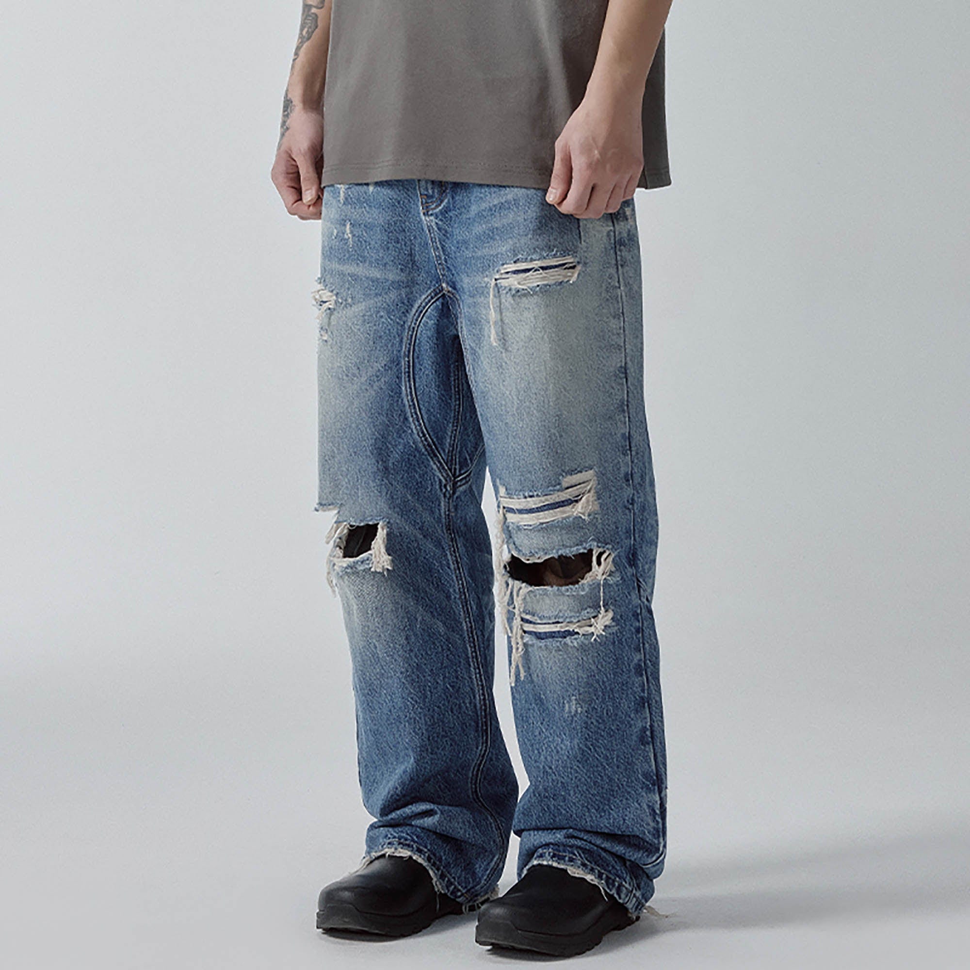 F2CE Ripped Curved Spliced Jeans
