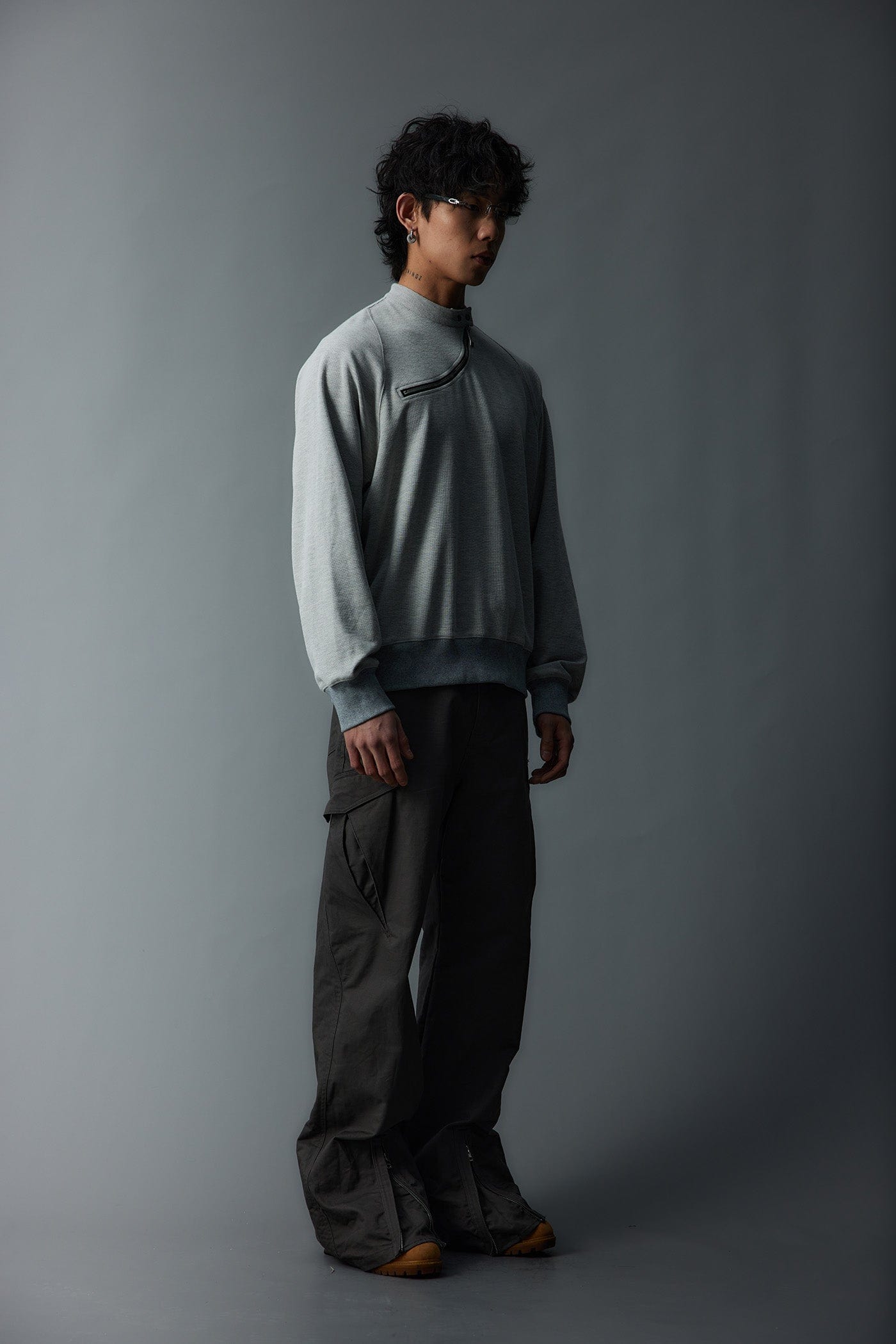 WHISTLEHUNTER Asymmetrical Zipper Rivet Mock Neck Light Sweatshirt