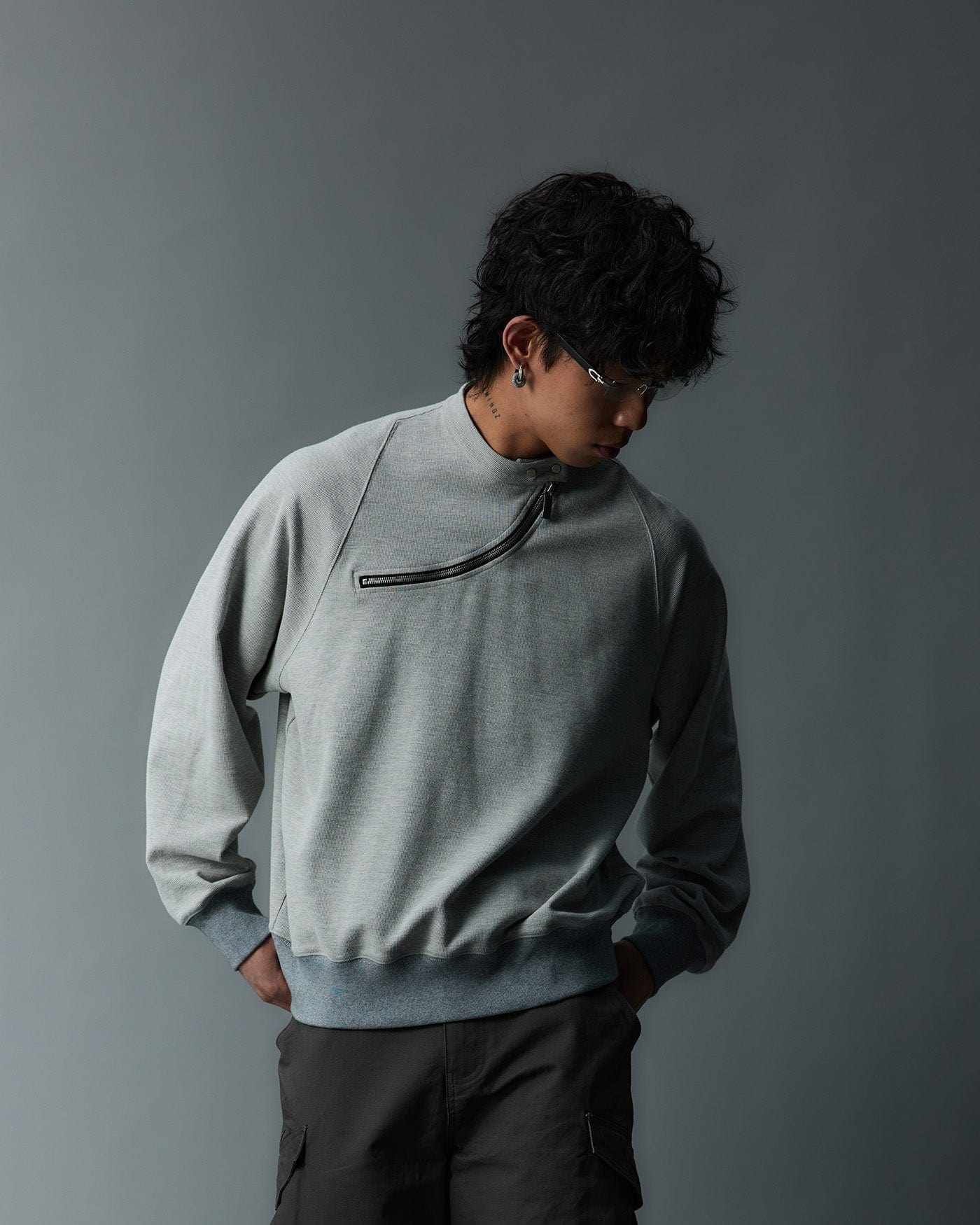 WHISTLEHUNTER Asymmetrical Zipper Rivet Mock Neck Light Sweatshirt