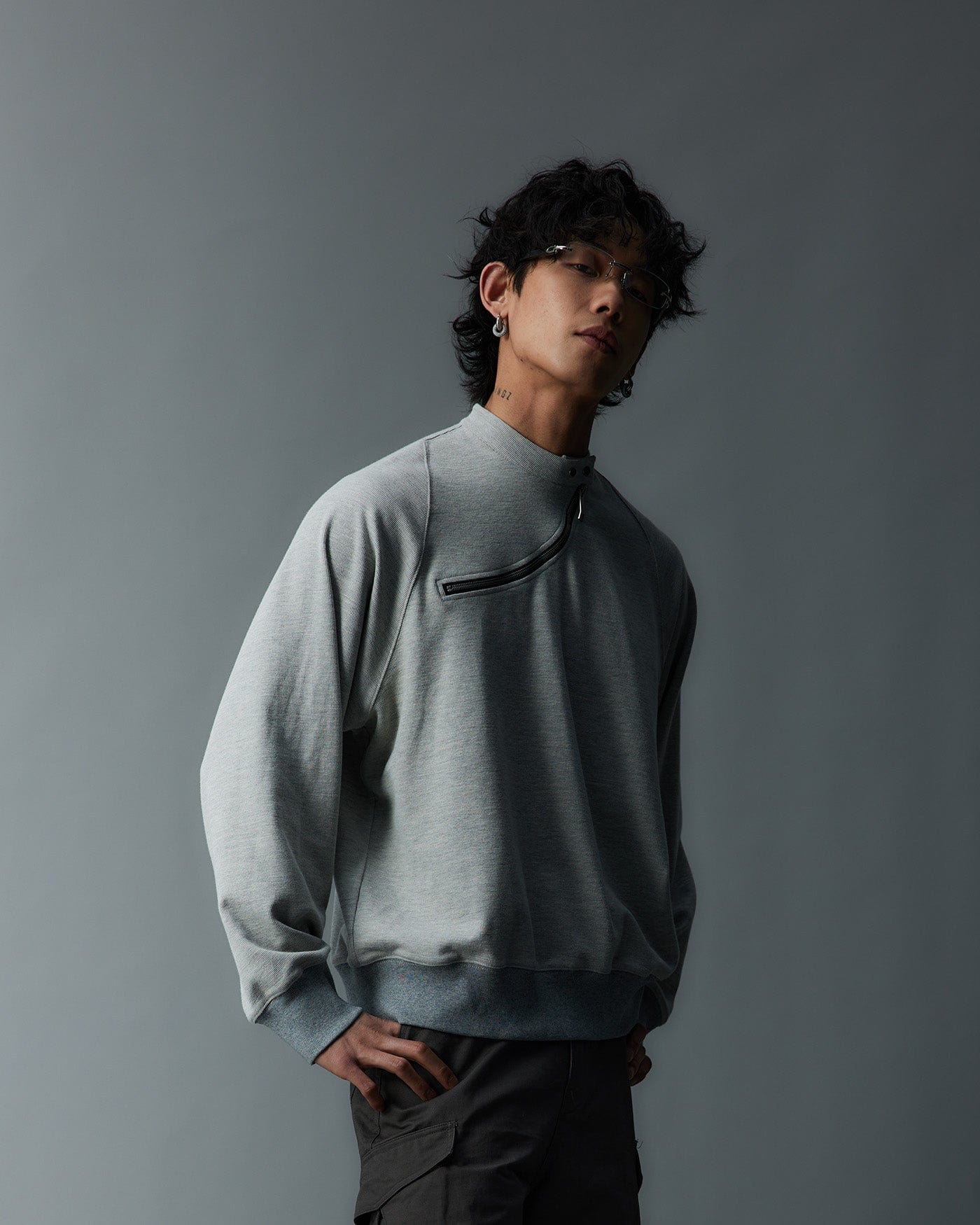 WHISTLEHUNTER Asymmetrical Zipper Rivet Mock Neck Light Sweatshirt