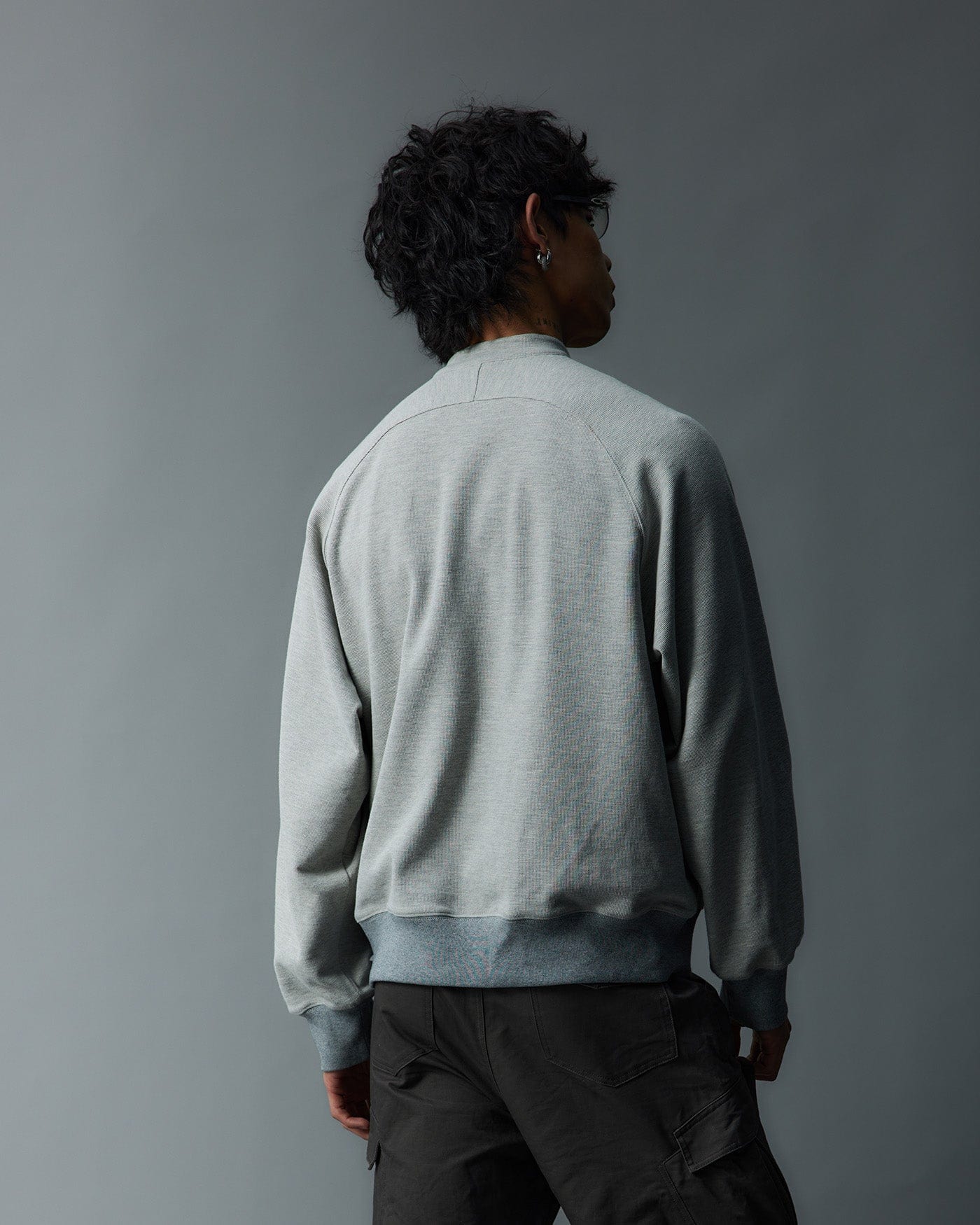 WHISTLEHUNTER Asymmetrical Zipper Rivet Mock Neck Light Sweatshirt